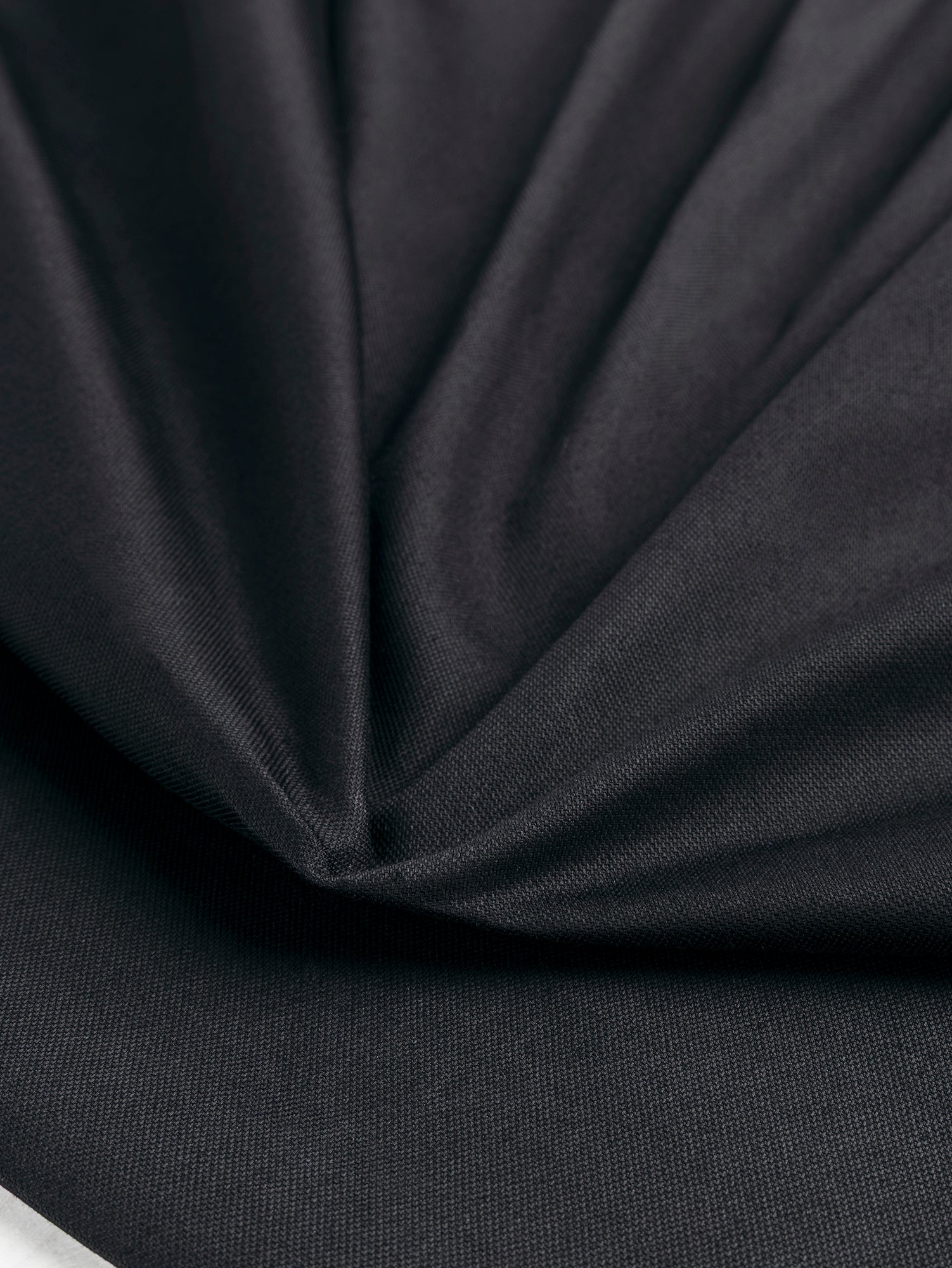 F-COT349-Organic-Cotton-Stretch-Canvas-Black-Core-Fabrics-scrunched.JPG