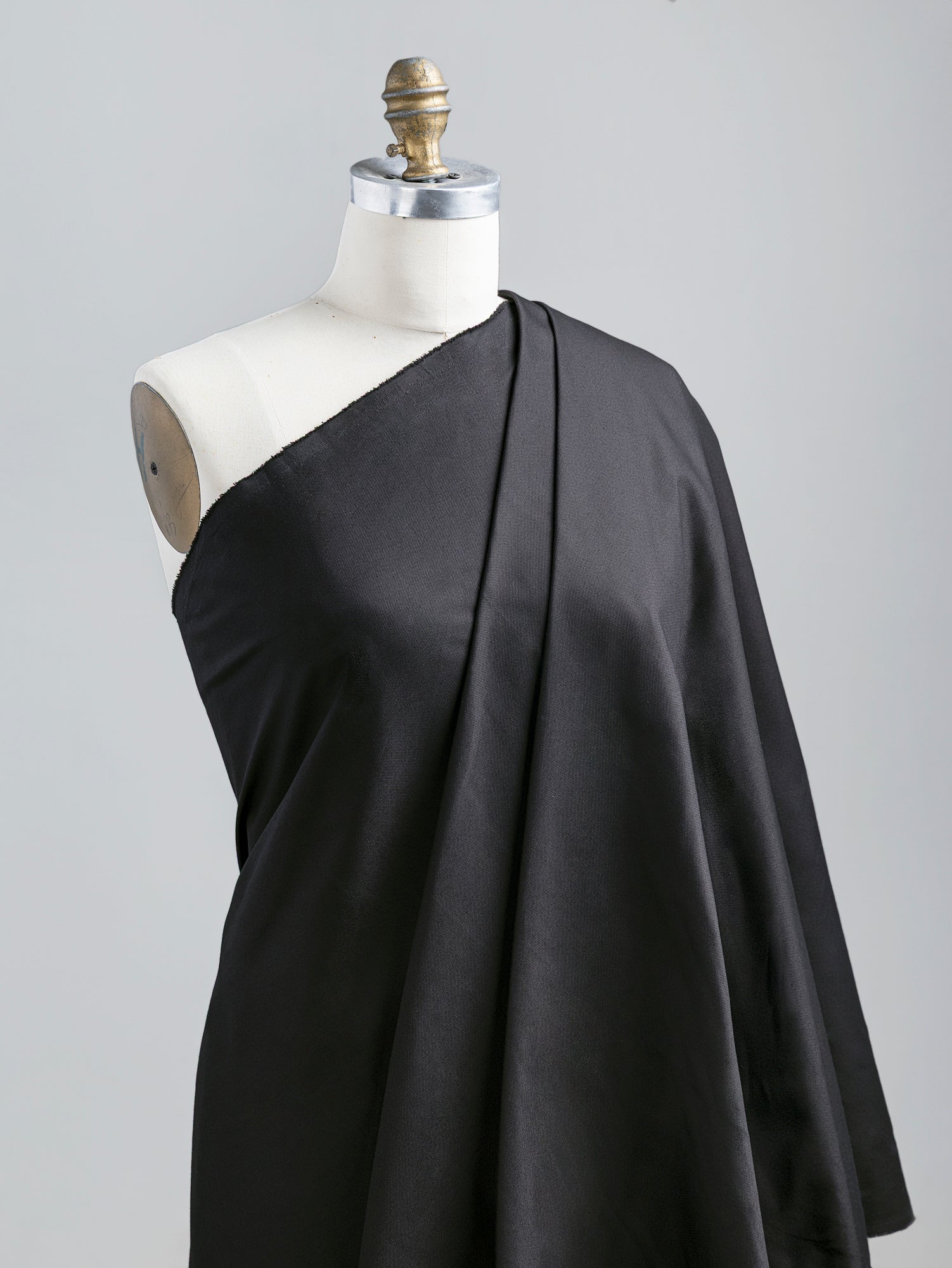F-COT349-Organic-Cotton-Stretch-Canvas-Black-Core-Fabrics-draped.JPG