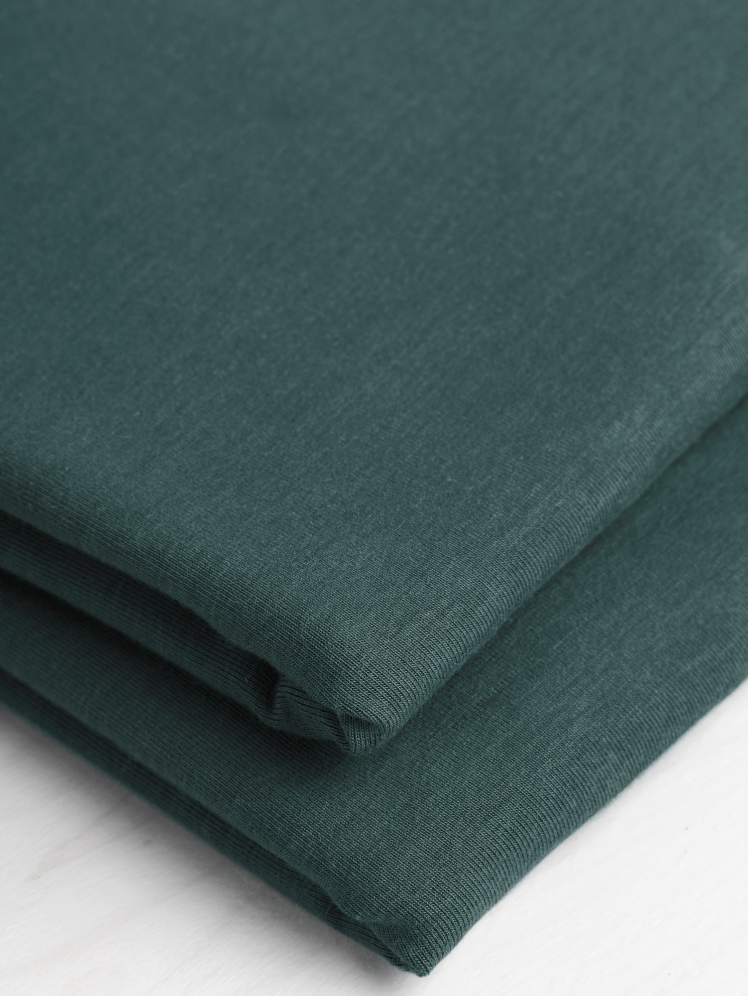 F-TEN008-022-Organic-Cotton-Tencel-Stretch-Knit-Jersey-Cyprès-Core-Fabrics-fold