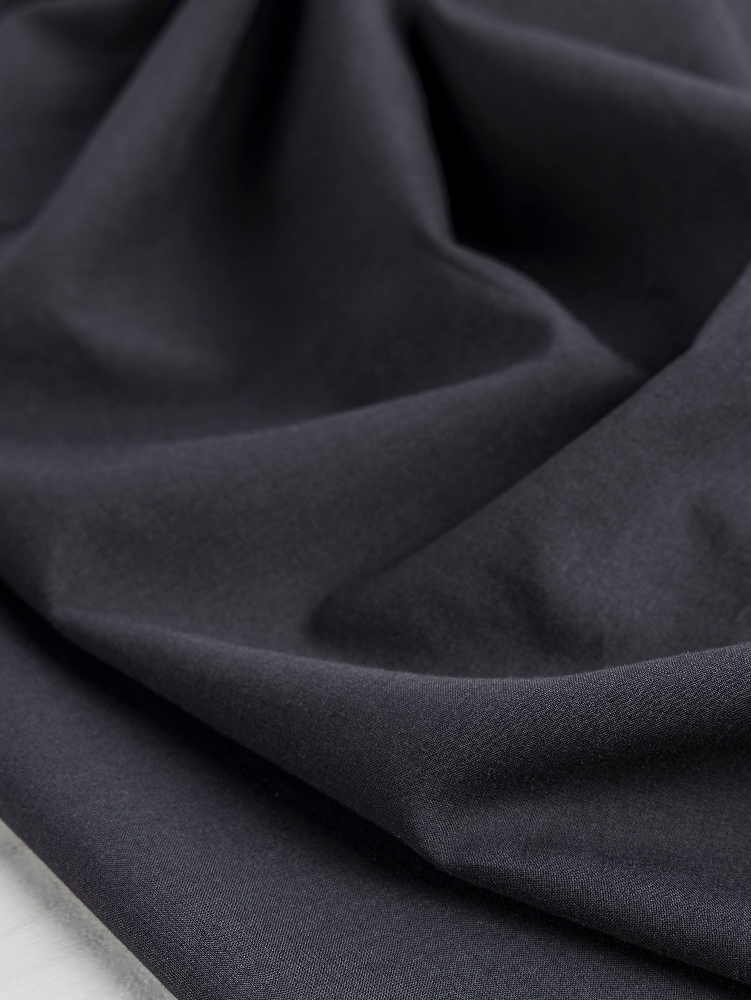 F-COT340-004-Organic-Cotton-Voile-Black-Core-Fabrics-scrunched