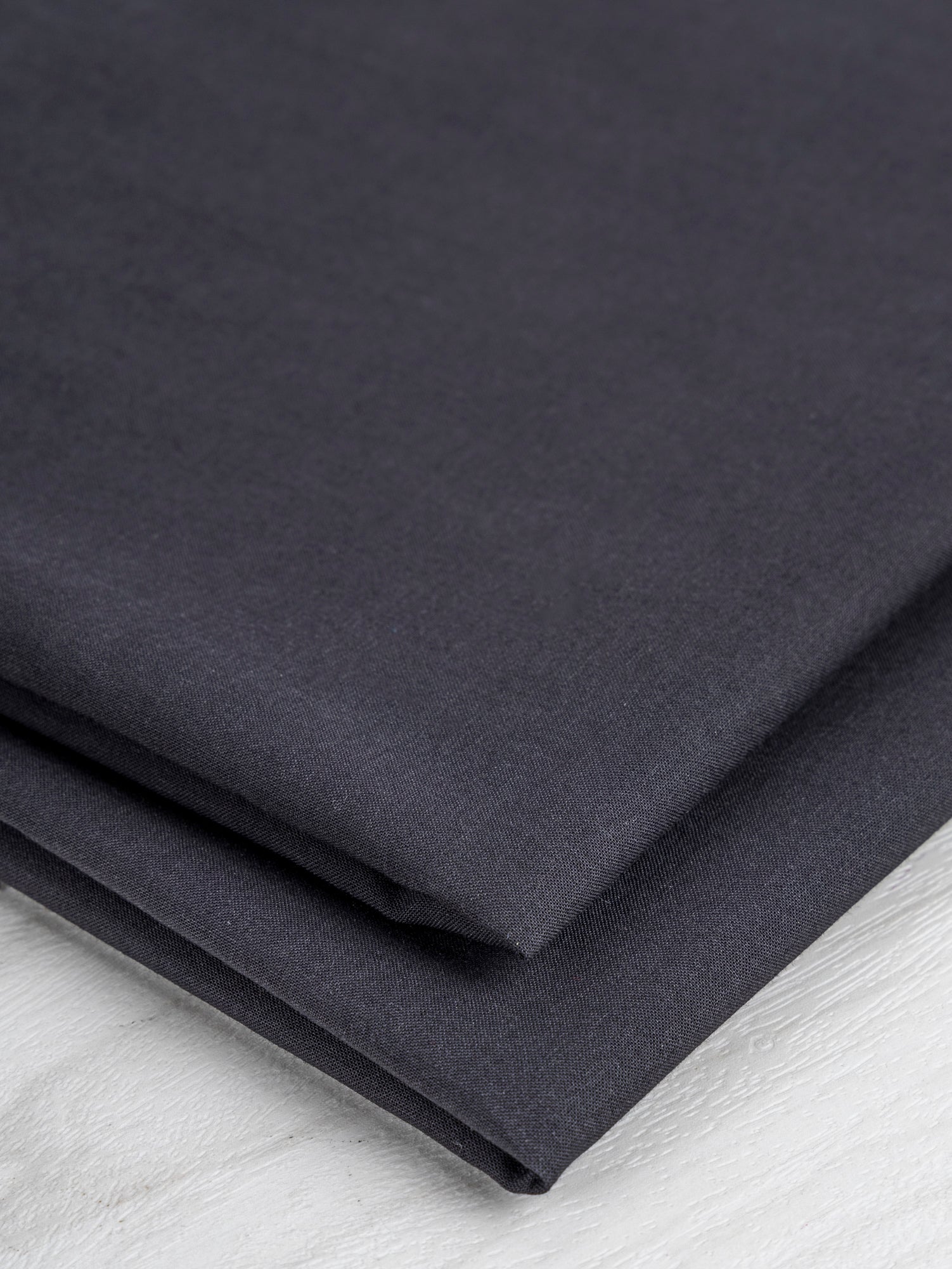 F-COT340-004-Organic-Cotton-Voile-Black-Core-Fabrics-fold