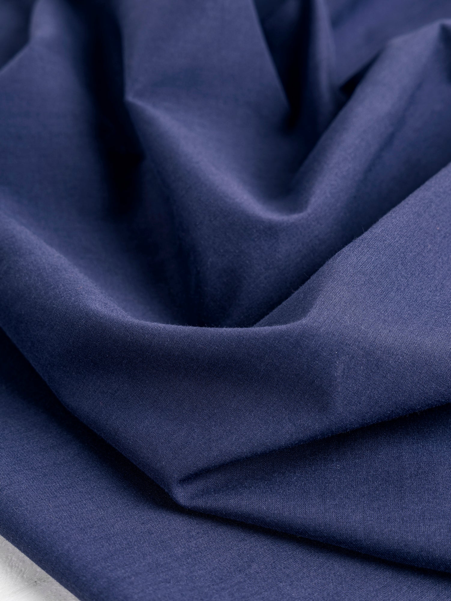 F-COT340-003-Organic-Cotton-Voile-Navy-Core-Fabrics-scrunched