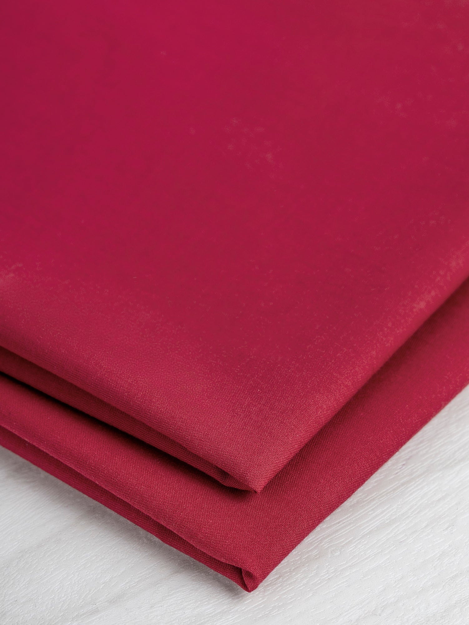 F-COT340-005-Organic-Cotton-Voile-Red-Core-Fabrics-fold