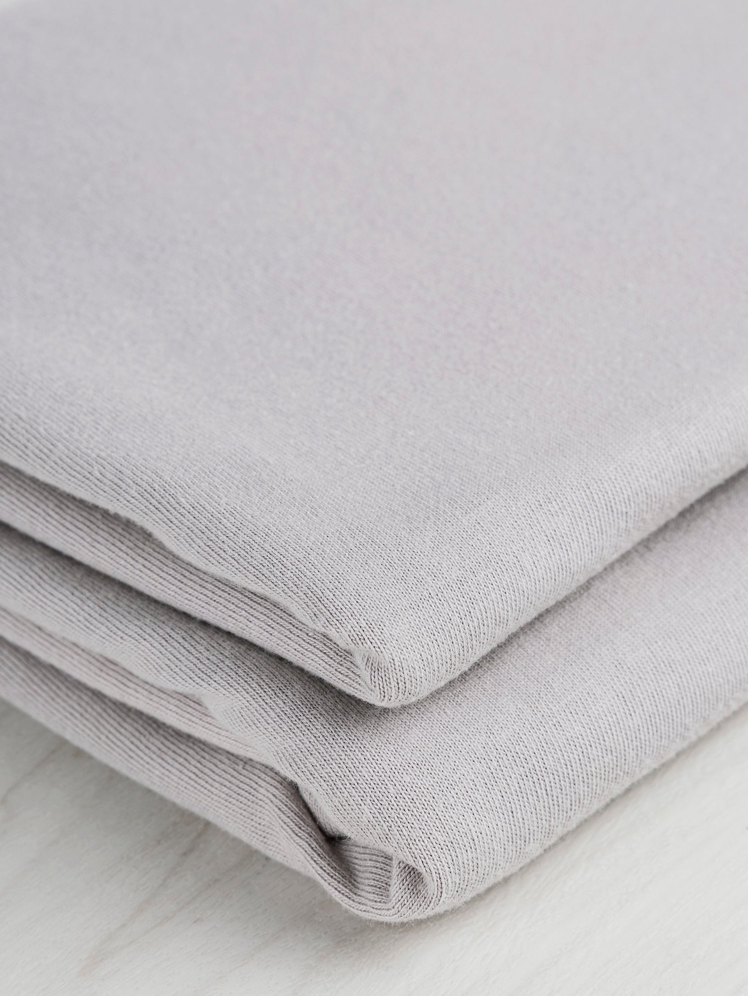 F-COT361-008-Organic-Cotton-Washed-Jersey-Knit-Cloud-Core-Fabrics-fold.JPG