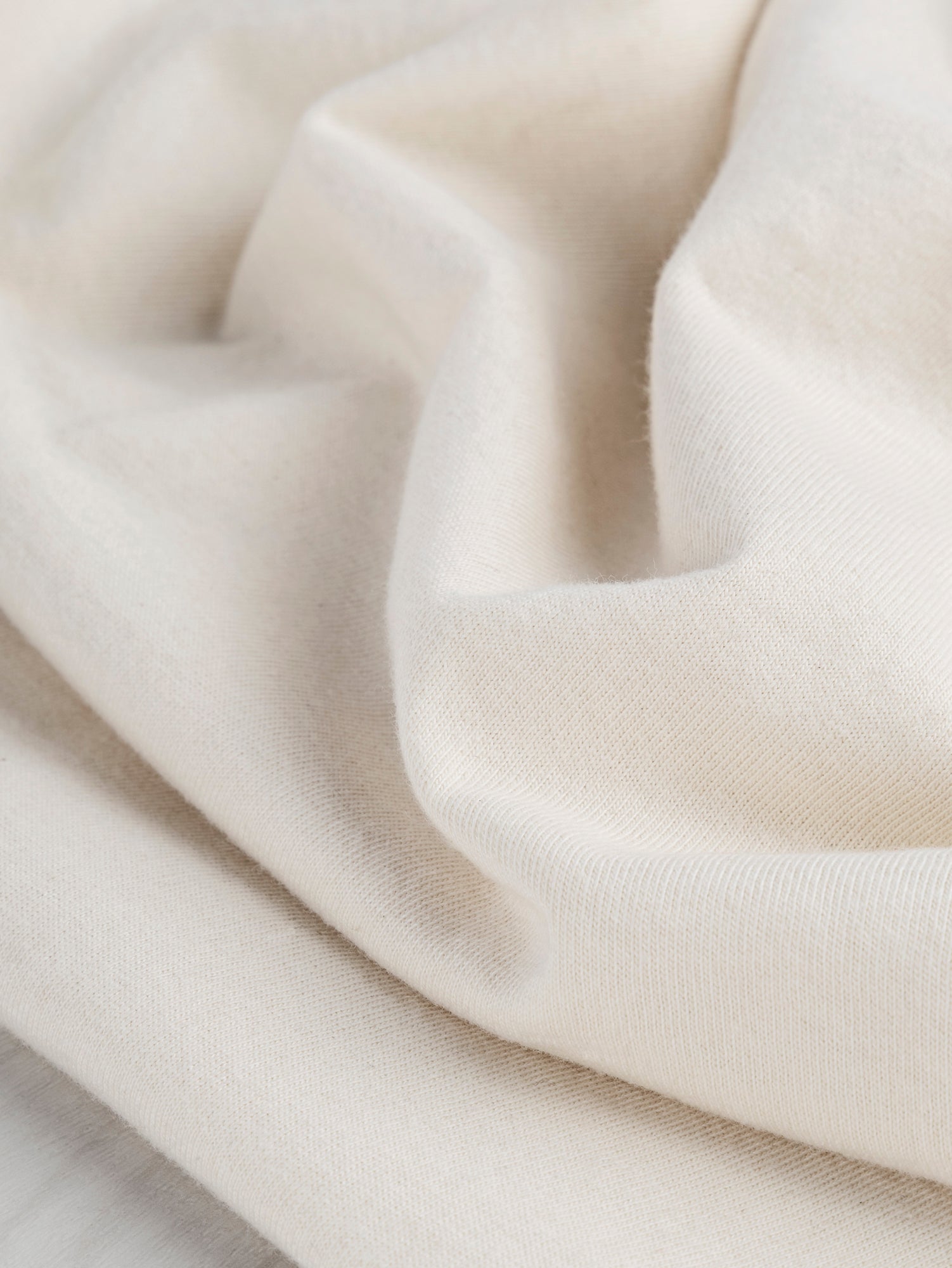 F-COT361-009-Organic-Cotton-Washed-Jersey-knit-Natural-Core-Fabrics-scrunched.JPG