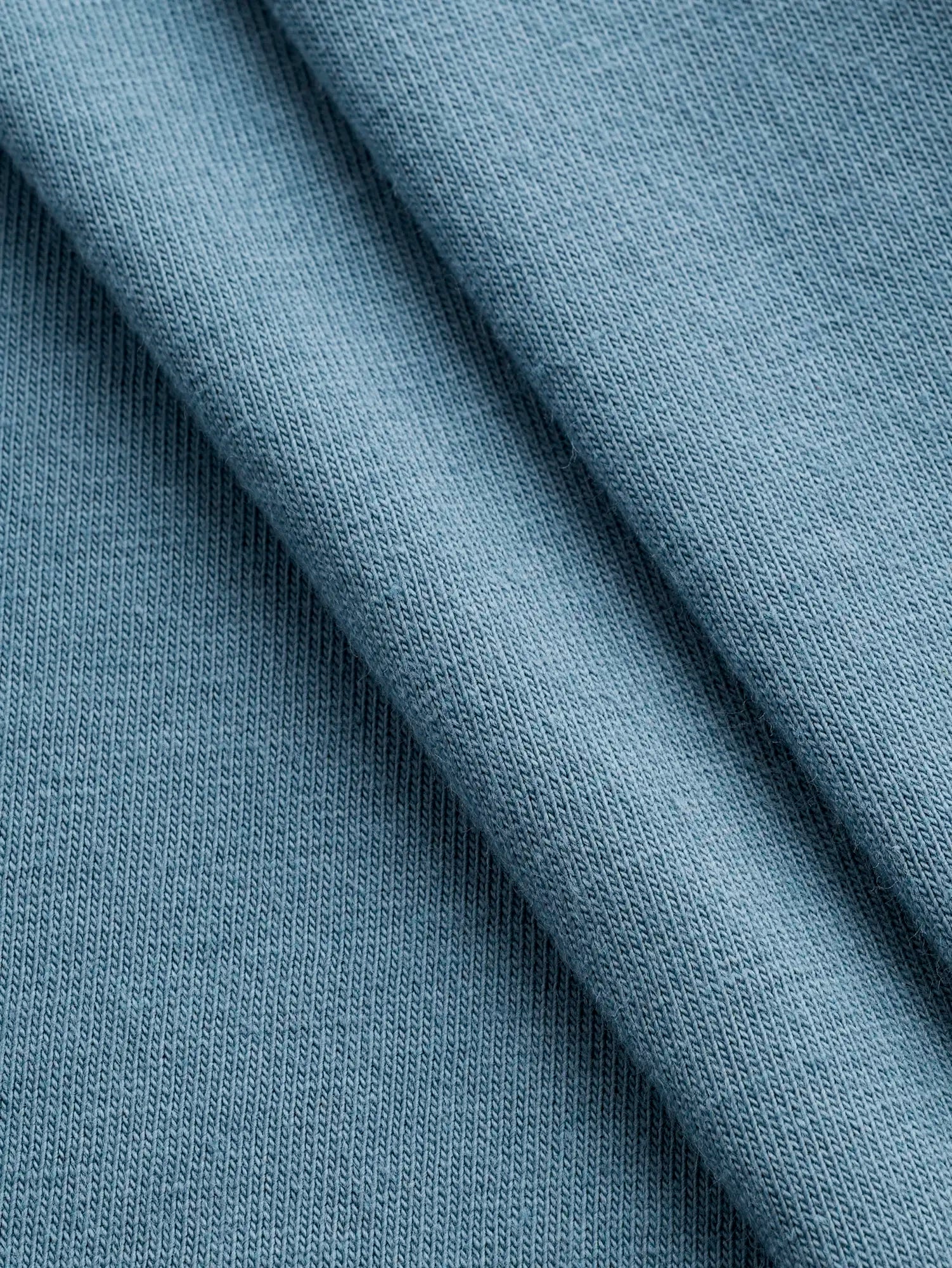F-COT361-025-Organic-Cotton-Washed-Jersey-Knit-Niagara-Core-Fabrics-fold.webp