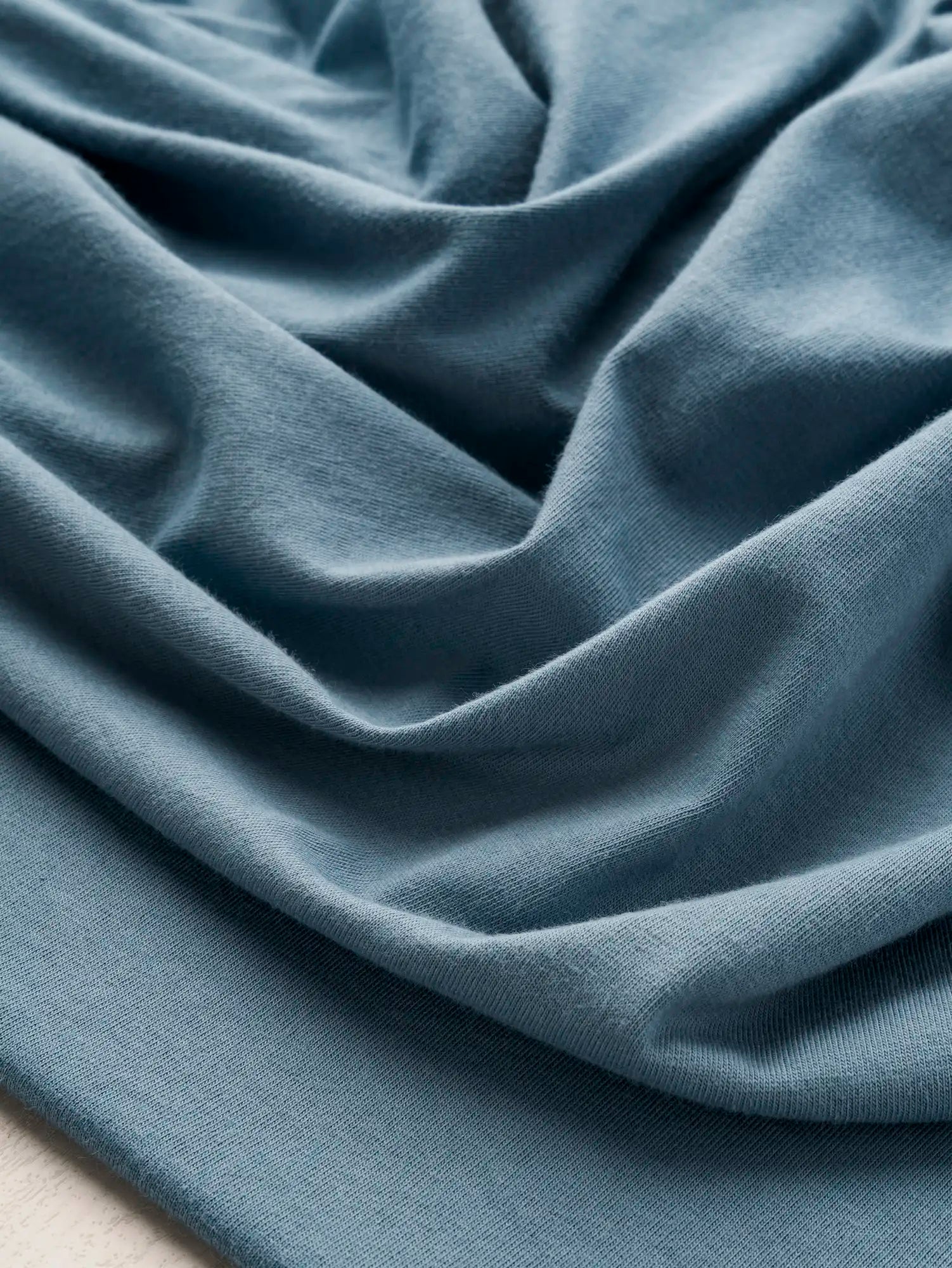 F-COT361-025-Organic-Cotton-Washed-Jersey-Knit-Niagara-Core-Fabrics-scrunched.webp