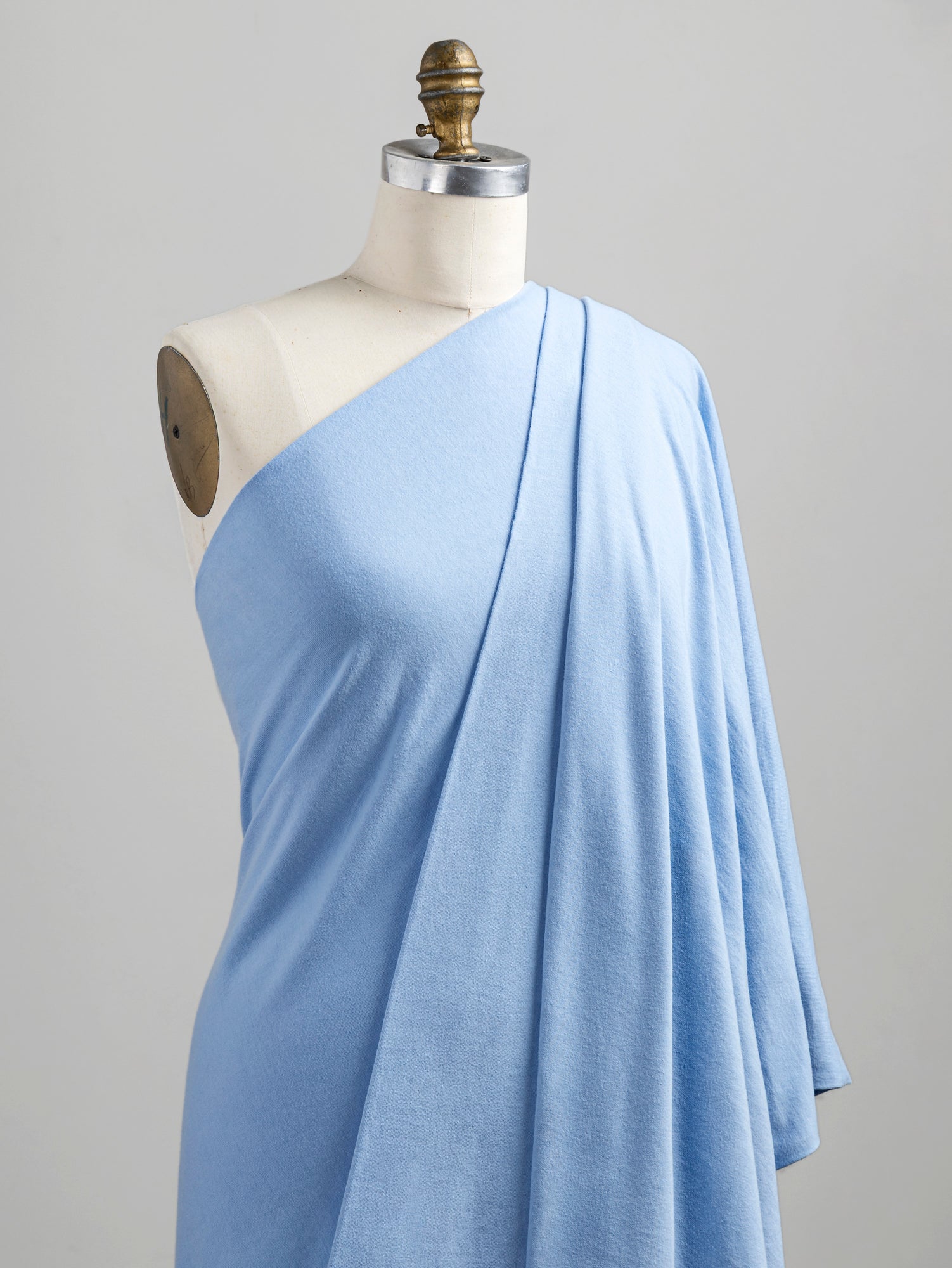 F-COT361-016-Organic-Cotton-Washed-Jersey-Knit-Powder-Blue-Core-Fabrics-draped.JPG