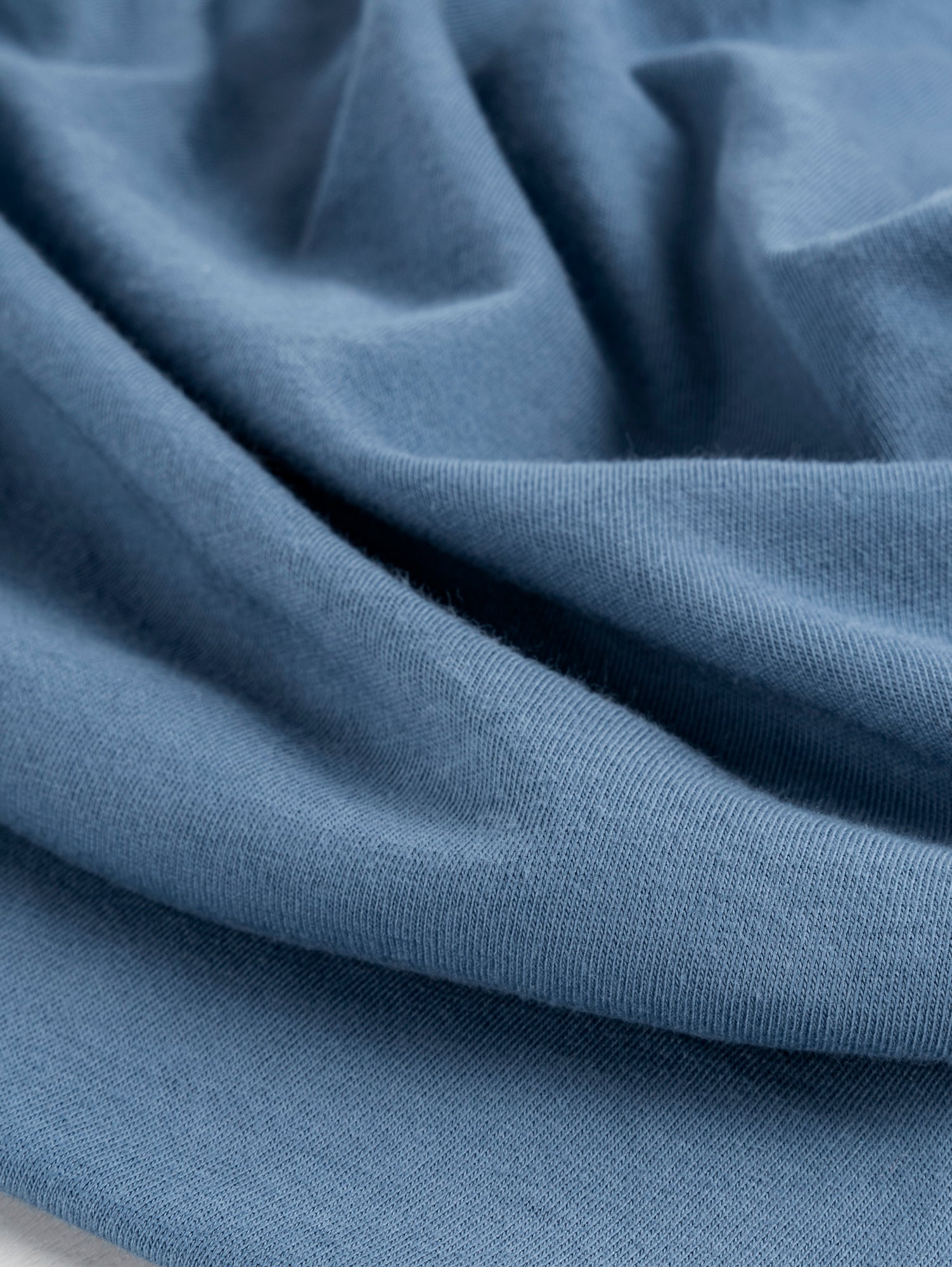 F-COT361-011-Organic-Cotton-Washed-Jersey-Knit-Steel-Blue-Core-Fabrics-scrunched.JPG