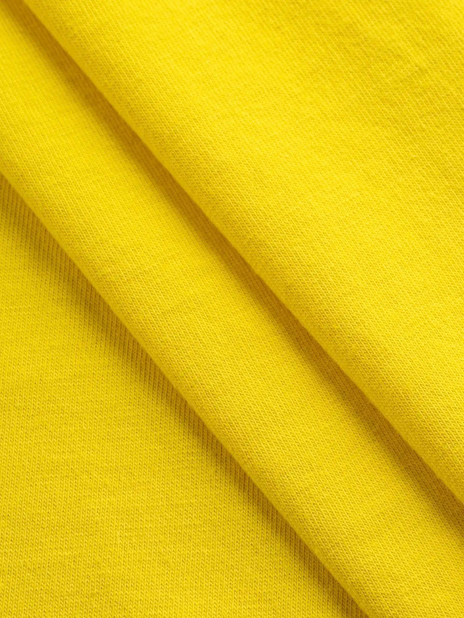 F-COT361-019-Organic-Cotton-Washed-Jersey Knit-Sunshine-Core-Fabrics-fold.webp