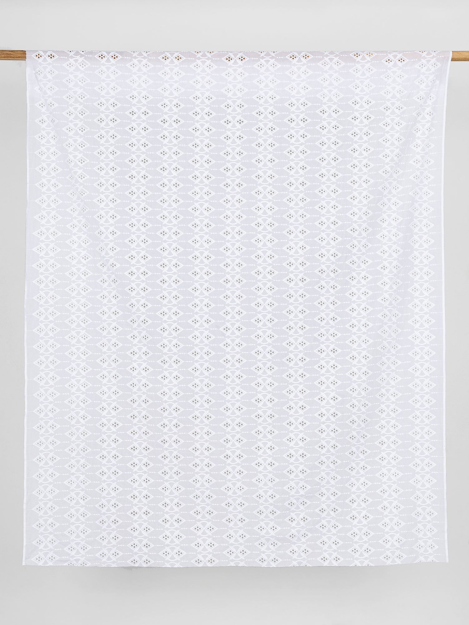 F-COT335-001-Ornament-Cotton-Eyelet-Deadstock-White-Core-Fabrics-draped