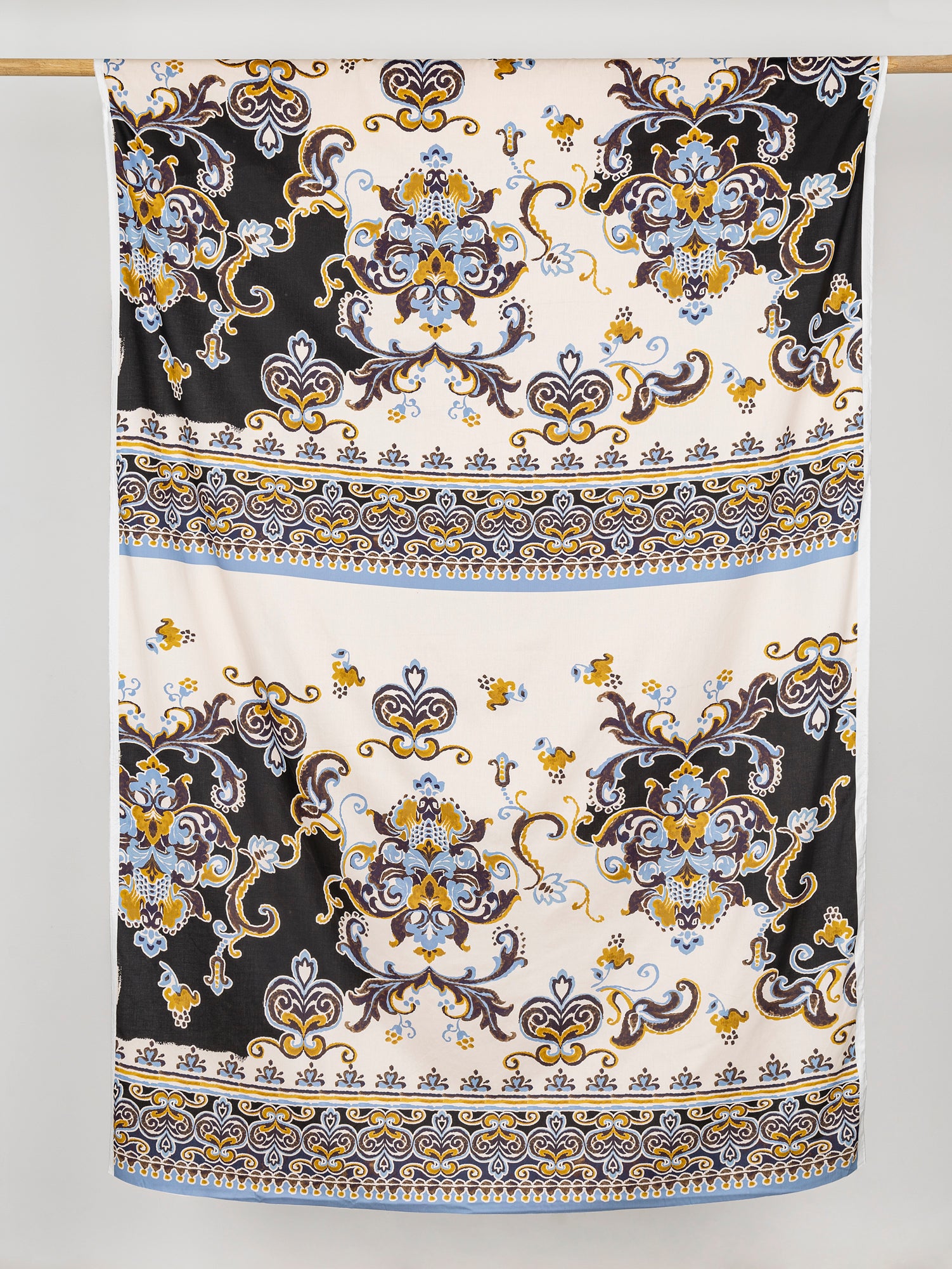 F-COT331-Ornamental-Panel-Print-Cotton-Lawn-Cream-Black-Ochre -and-Periwinkle-Core-Fabrics-draped.JPG