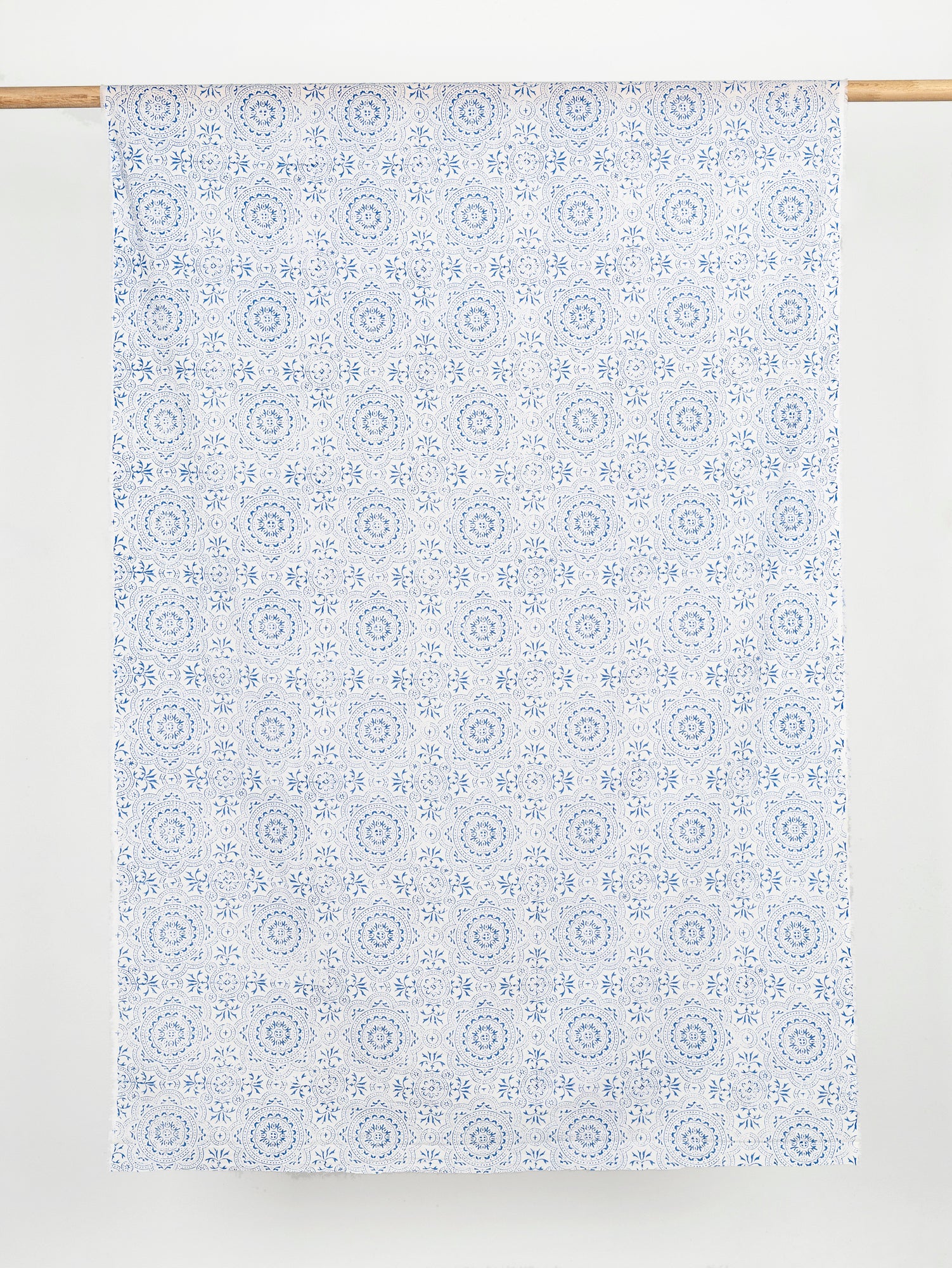 F-COT351-002-Ornement-Block-Print-Cotton-Voile-White-Blue-Core-Fabrics-draped.JPG