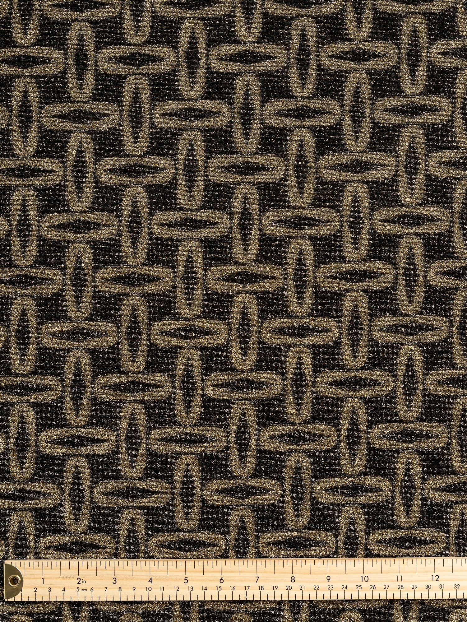 F-DEA116-Oval-Stretch-Knit-Deadstock-Black-Gold-Core-Fabrics-ruler.JPG