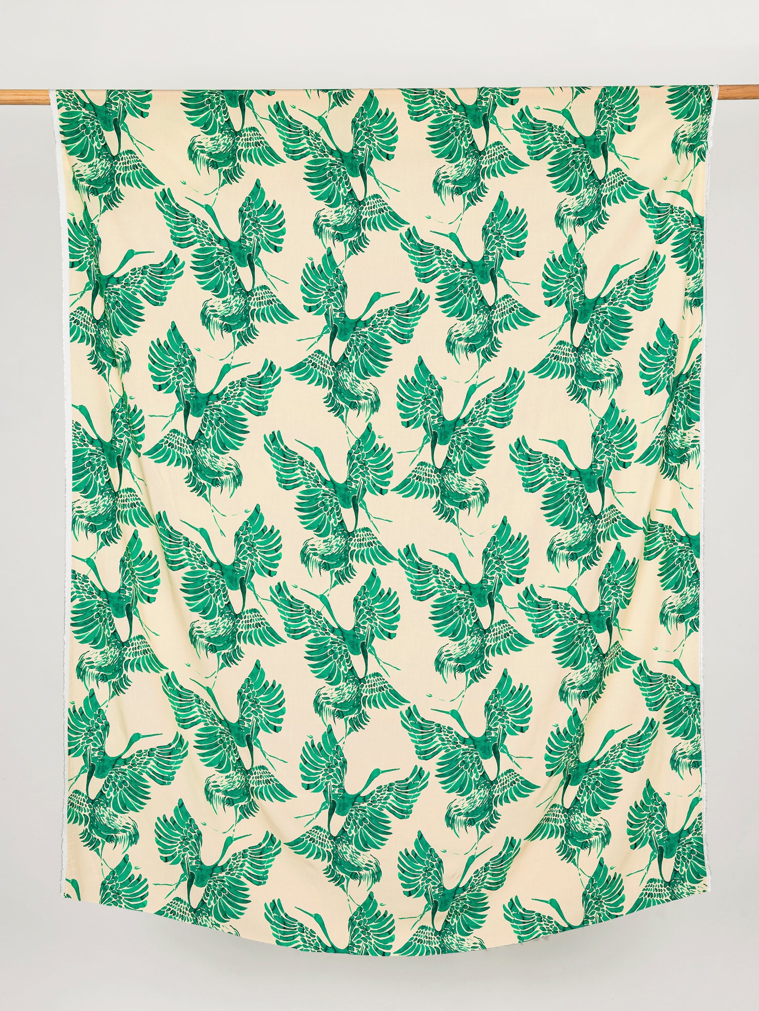 F-VIS250-Painted-Plumage-Print-Ecovero-Viscose-Cream+Green-Core-Fabrics-draped.JPG