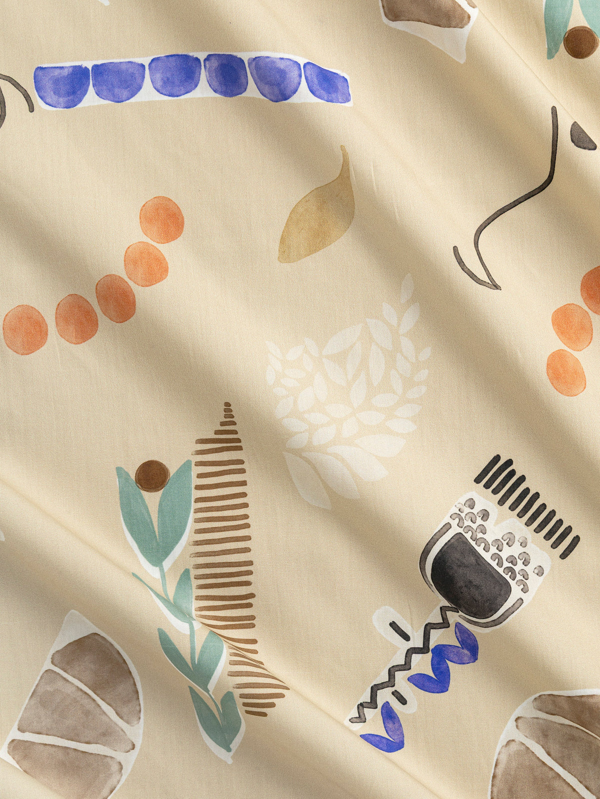 F-COT482-Painterly-Flower-Print-BCI-Cotton-Poplin-Oat-Periwinkle-and-Black-Core-Fabrics-scrunched.webp