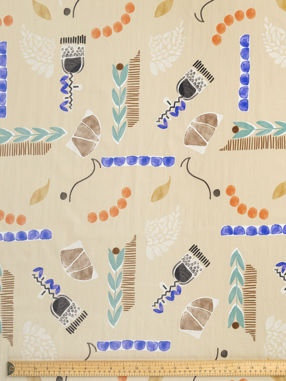 F-COT482-Painterly-Flower-Print-BCI-Cotton-Poplin-Oat-Periwinkle-and-Black-Core-Fabrics-ruler.webp