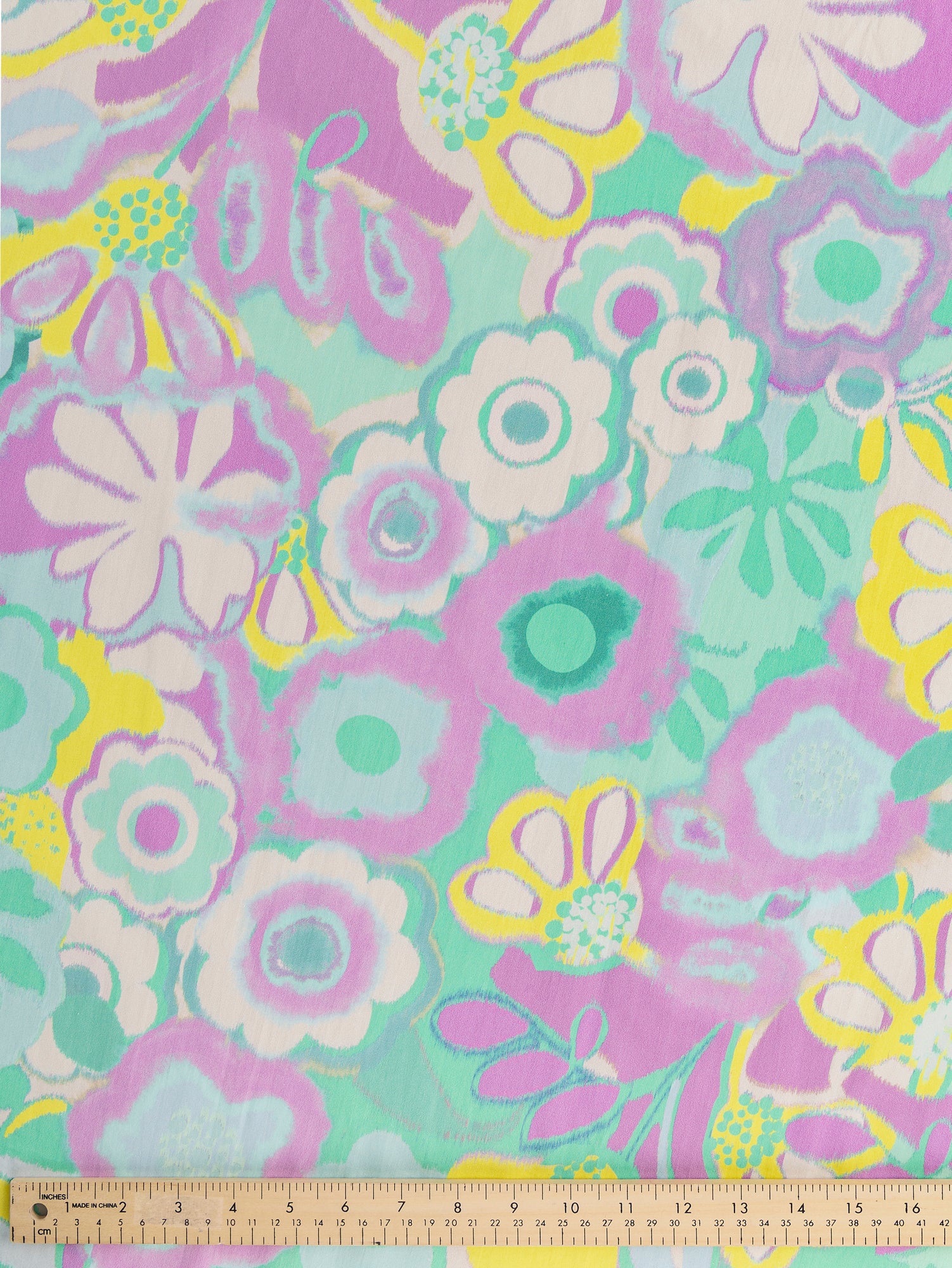 F-COT344-Pastel-Garden-Print-Cotton-Lawn-Cream-Lilac-Green-and-Yellow-Core-Fabrics-ruler.JPG