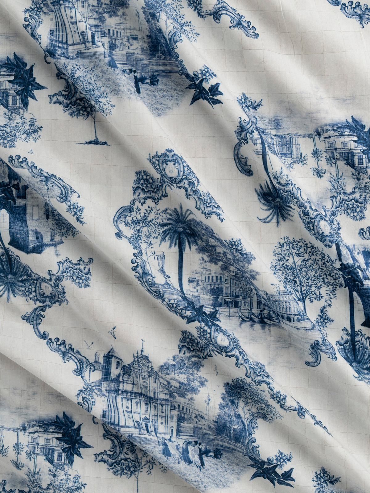 F-COT498-Pastoral-Toile-de-Jouy-Print-Cotton-Poplin-White-and-Indigo-Core-Fabrics-scrunched.webp