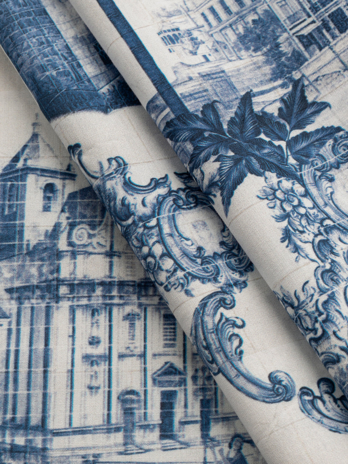F-COT498-Pastoral-Toile-de-Jouy-Print-Cotton-Poplin-White-and-Indigo-Core-Fabrics-fold.webp