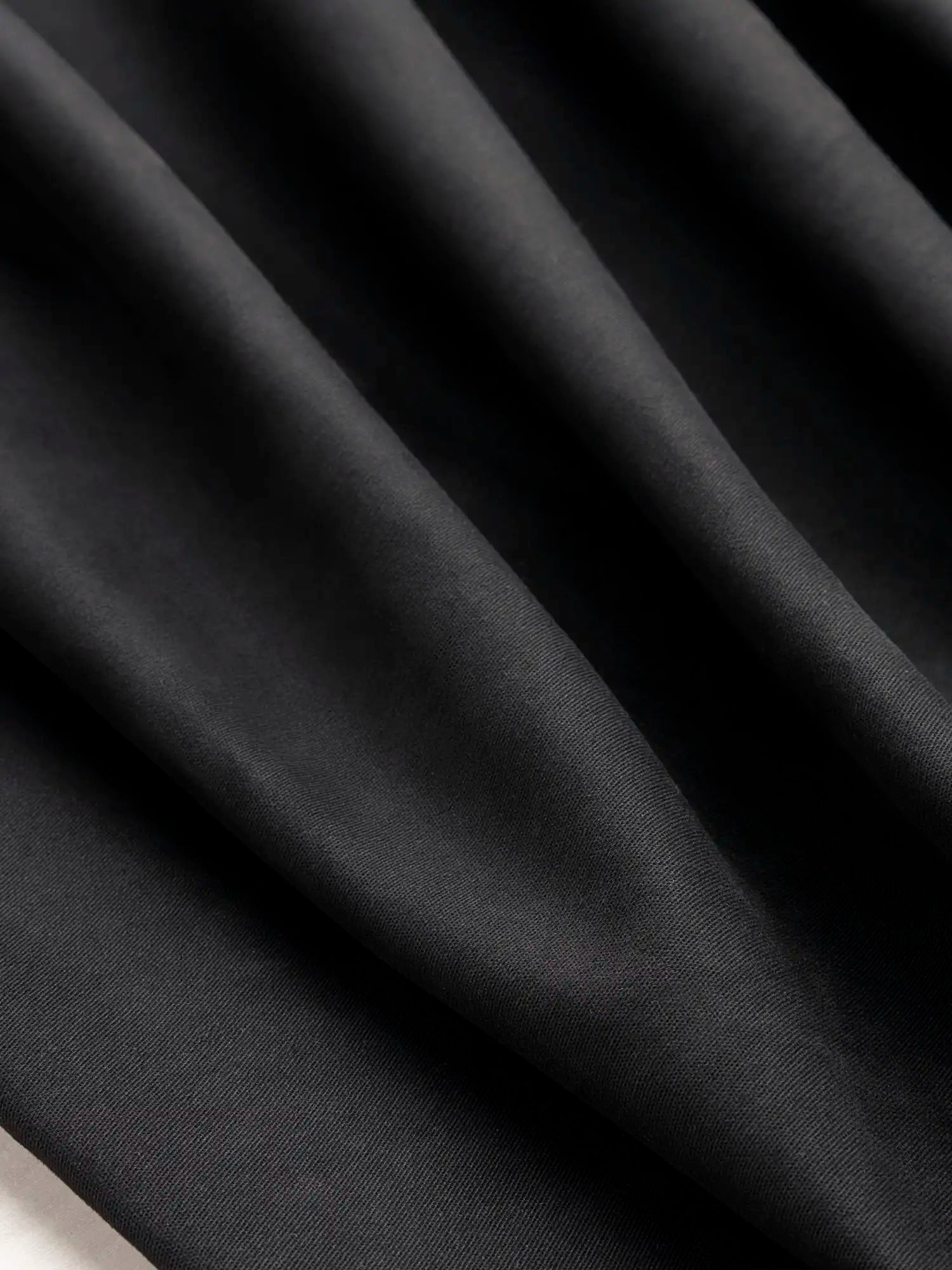 F-DEA167-001-Peached-Stretch-Canvas-Deadstock-Black-Core-Fabrics-scrunched.webp