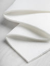 N-INT014-Pellon-Flex-Foam-1-Sided-Fusible-White-Core-Fabrics-scrunched.JPG