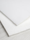 N-INT014-Pellon-Flex-Foam-1-Sided-Fusible-White-Core-Fabrics-fold.JPG