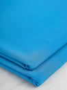 F-DEA050-Performance-Knit-Deadstock-Cerulean-Blue-Core-Fabrics-fold.JPG
