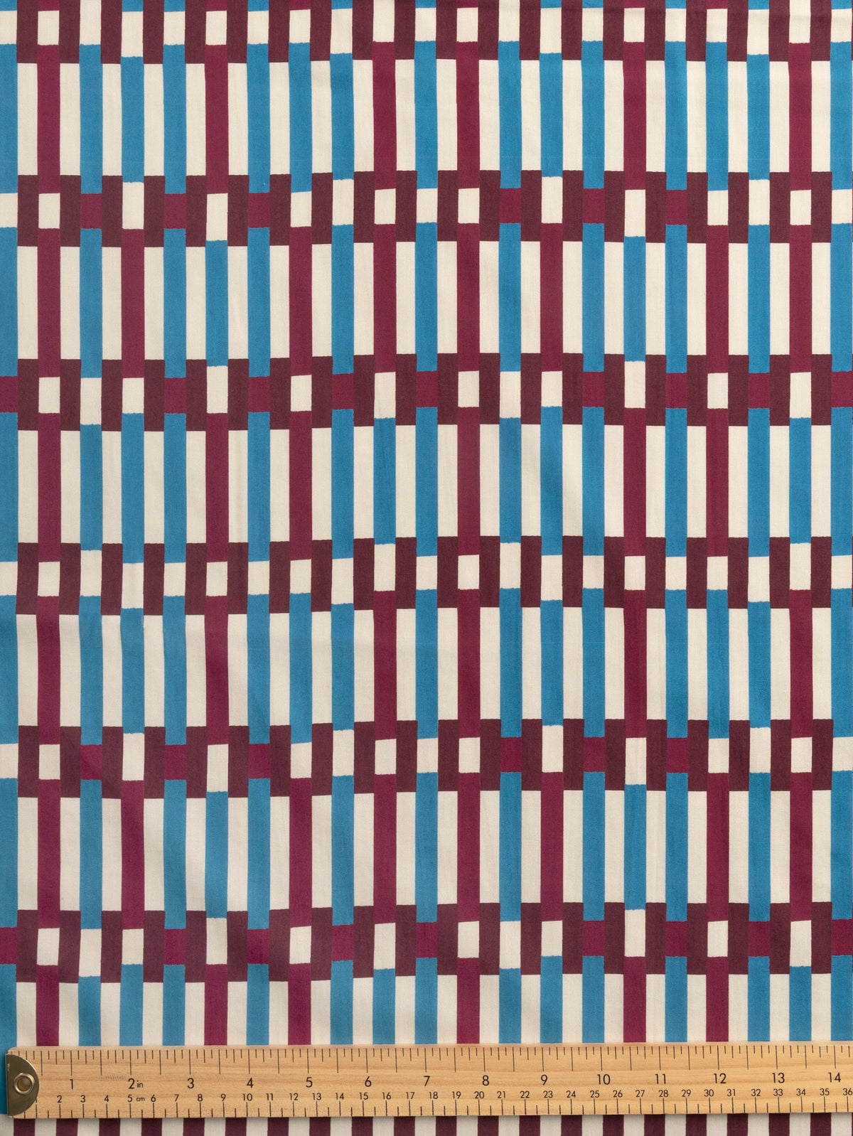 F-COT480-Piano-Print-BCI-Cotton-Poplin-Bordeaux-Cerulean-and-Ivory-Core-Fabrics-ruler.webp