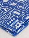 F-PES037-Picnic-Tile-Print-Recycled-Swim-Performance-Knit-Royal-Blue-and-White-Core-Fabrics-fold.JPG