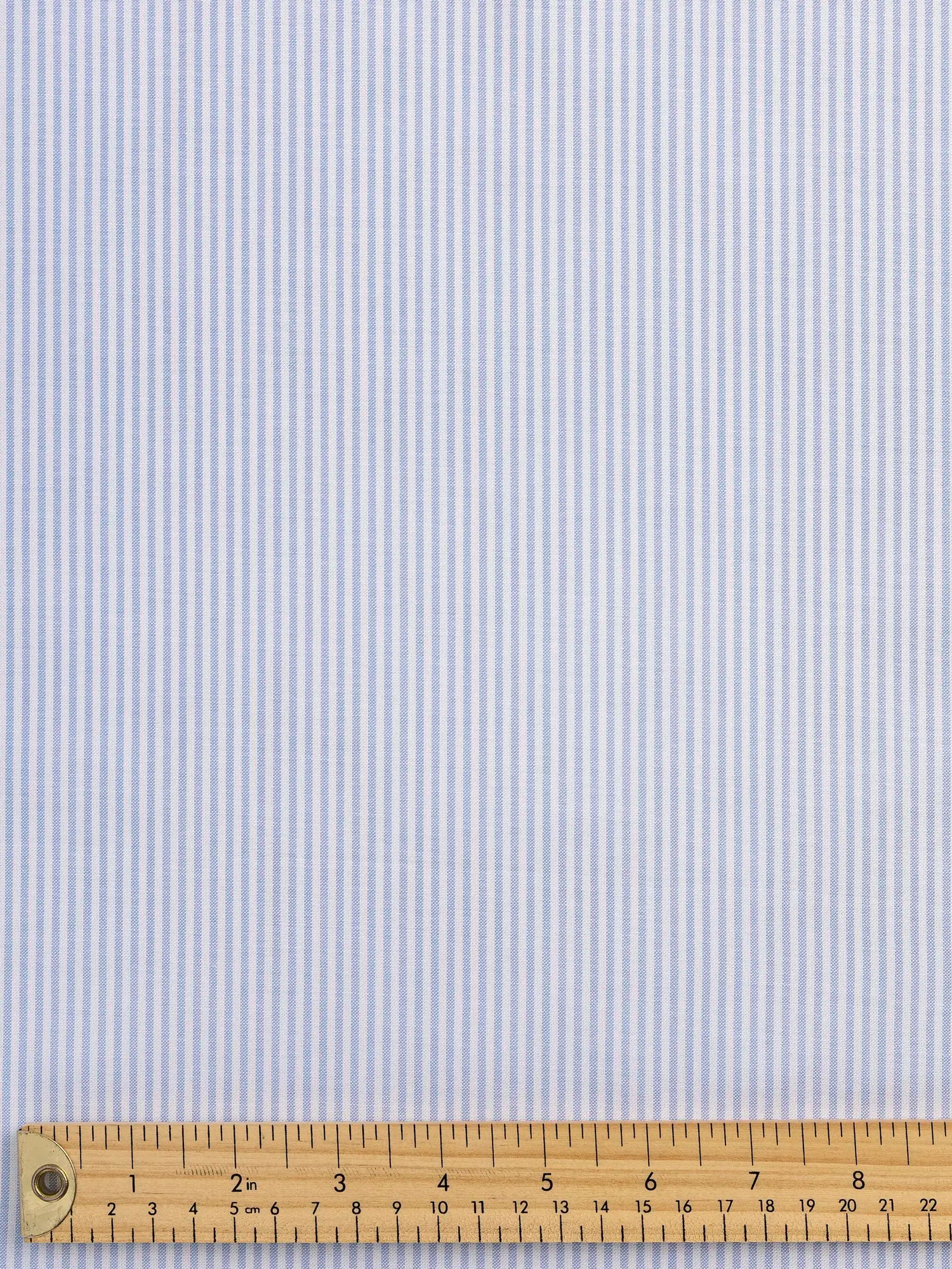 F-COT450-001-Pinpoint-Striped-Cotton-Oxford-Shirting-Chambray-and-White-Core-Fabrics-ruler.webp