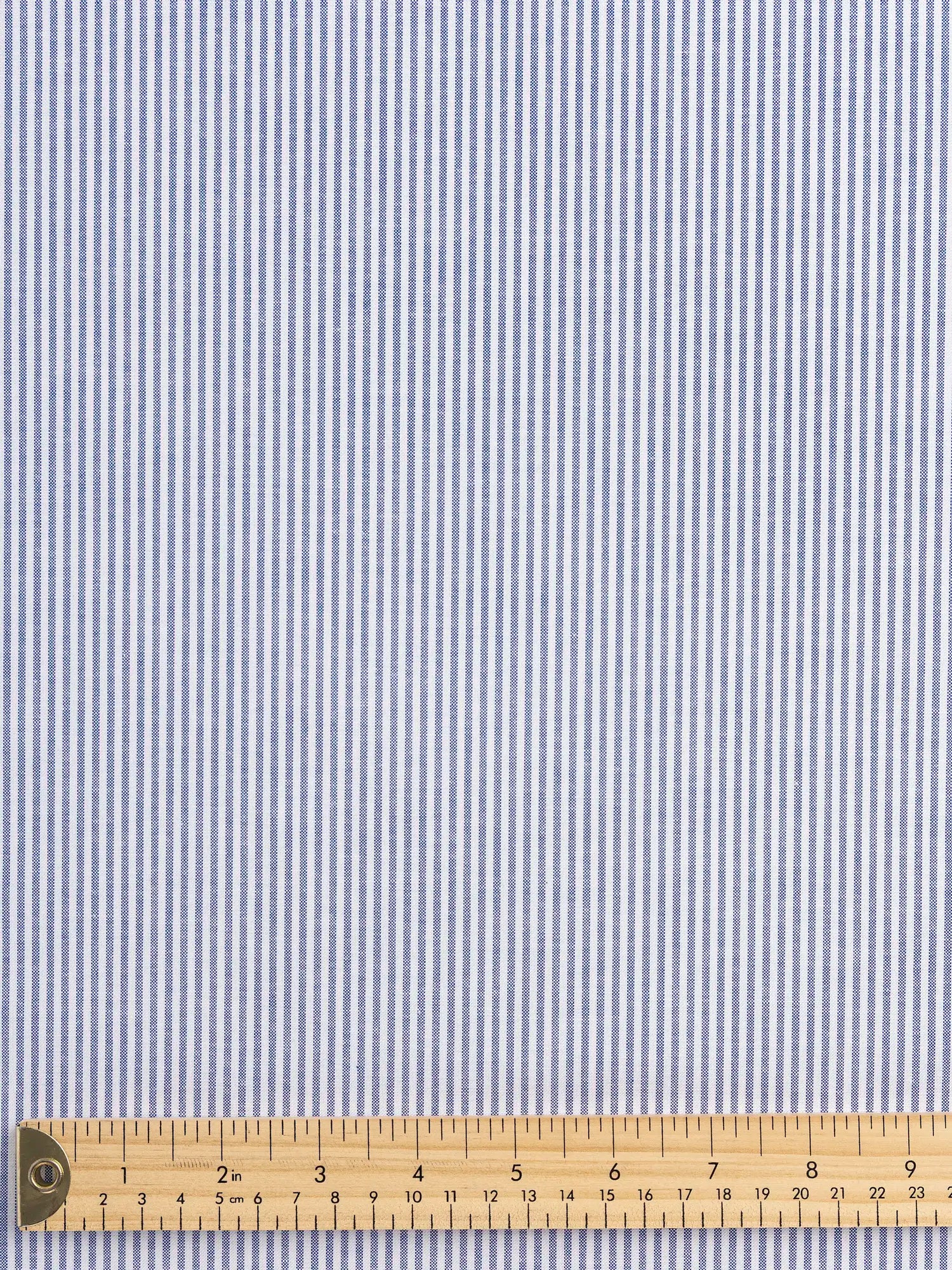 F-COT450-003-Pinpoint-Striped-Cotton-Oxford-Shirting-Indigo-and-White-Core-Fabrics-ruler.webp
