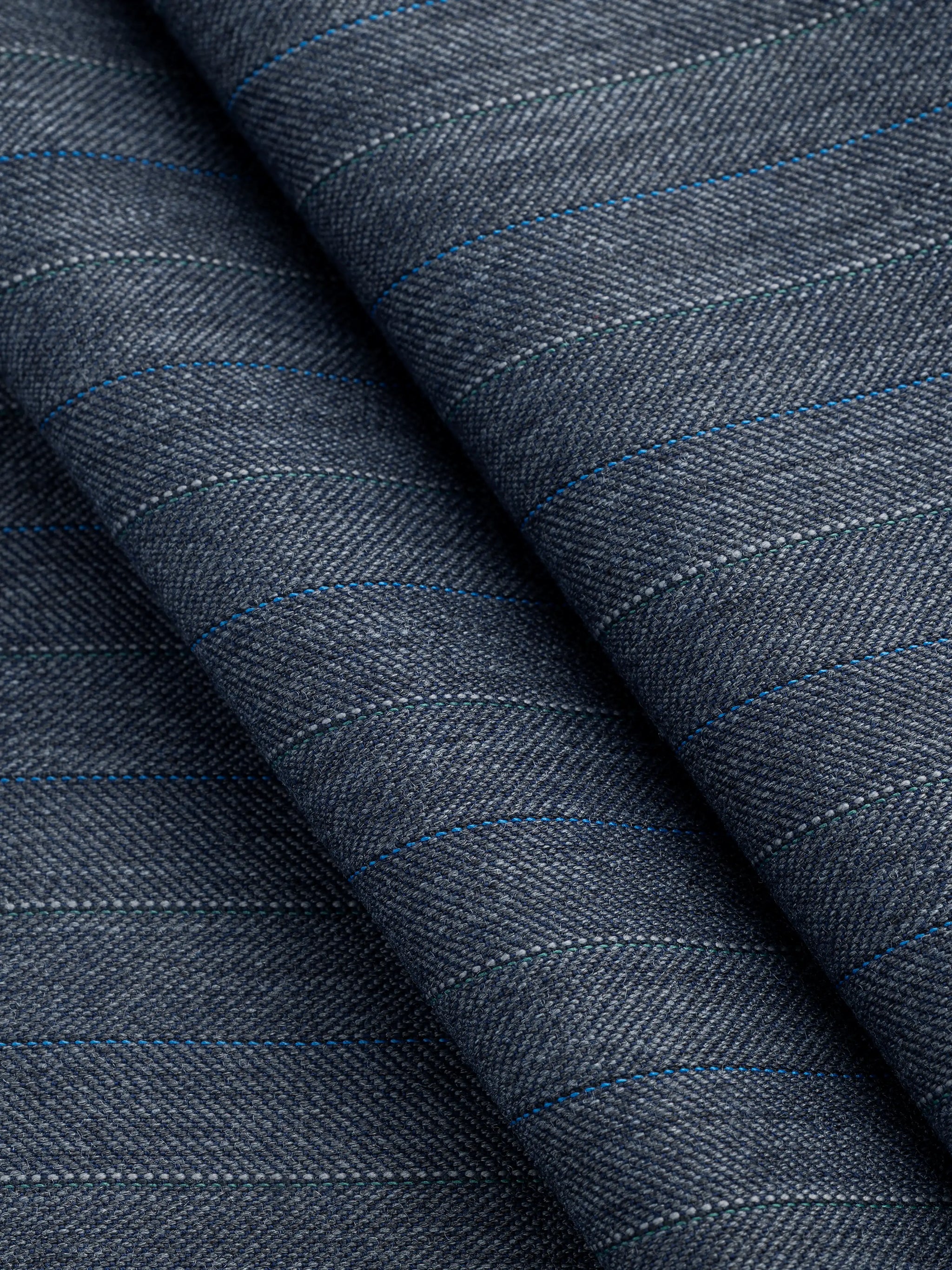 F-WOL097-Pinstripe-Chevron-Italian-Wool-Suiting-Deadstock-Graphite-Blue-and-Green-Core-Fabrics-fold.webp