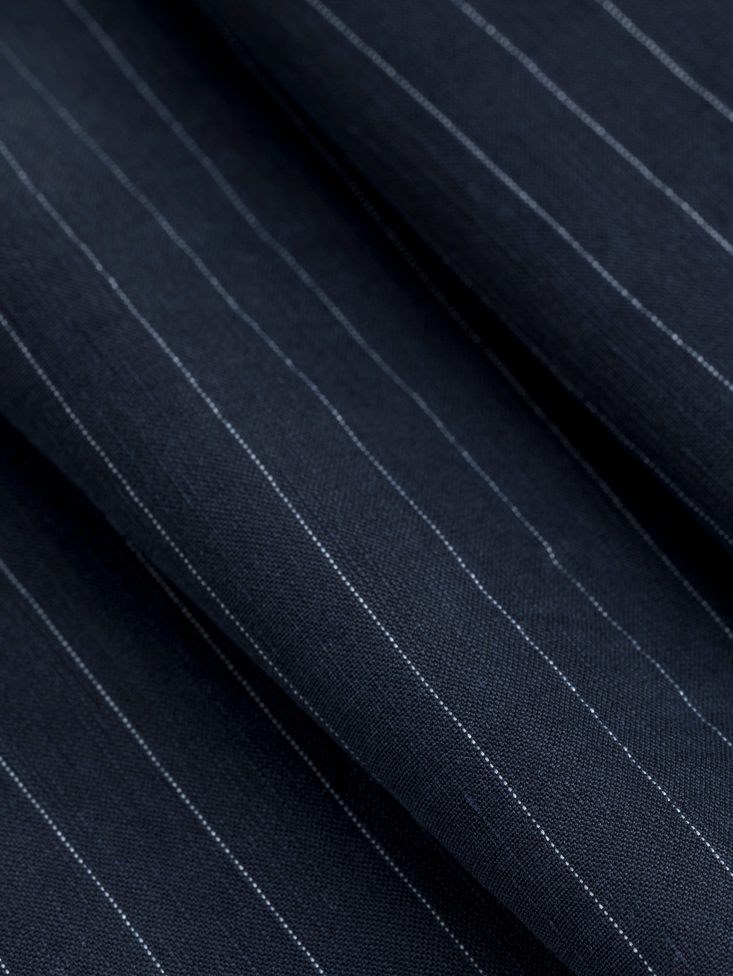 F-DEA075-Pinstripe-Linen-Tencel-Suiting-Deadstock-Navy-White-Core-Fabrics-fold.JPG
