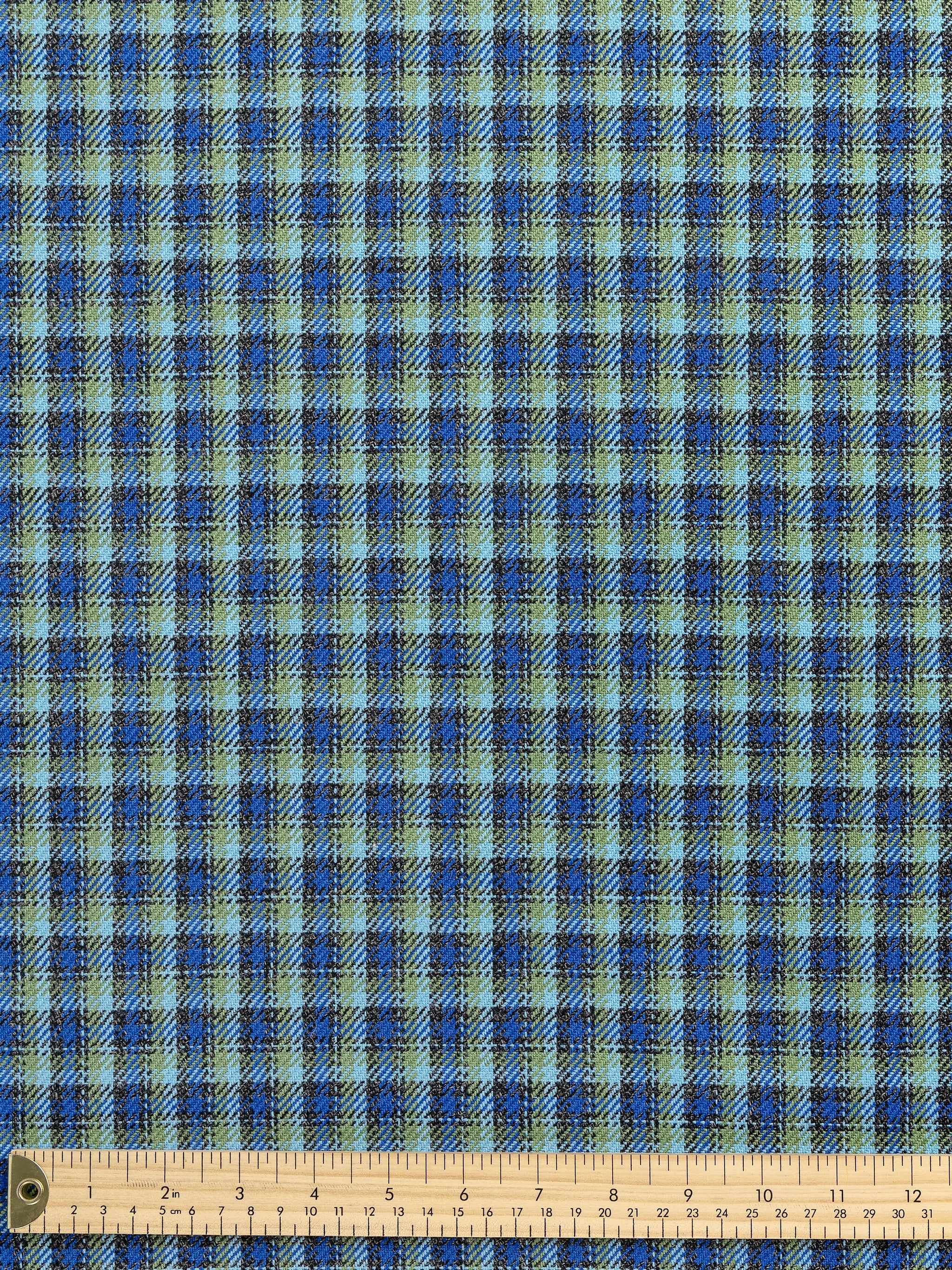 F-WOL125-Plaid-Italian-Wool-Suiting-Deadstock-Blue-Green-and-Grey-Core-Fabrics-ruler.webp