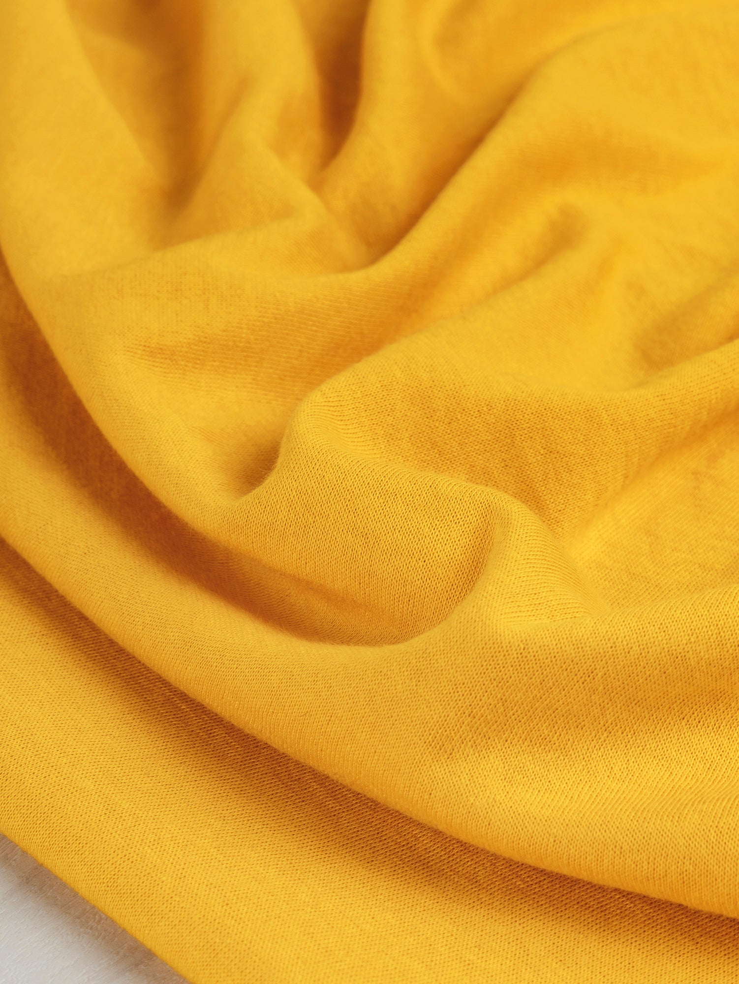 F-DEA048-Pointelle-Double-Knit-Deadstock-Mango-Core-Fabrics-scrunched.JPG