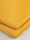 F-DEA048-Pointelle-Double-Knit-Deadstock-Mango-Core-Fabrics-fold.JPG
