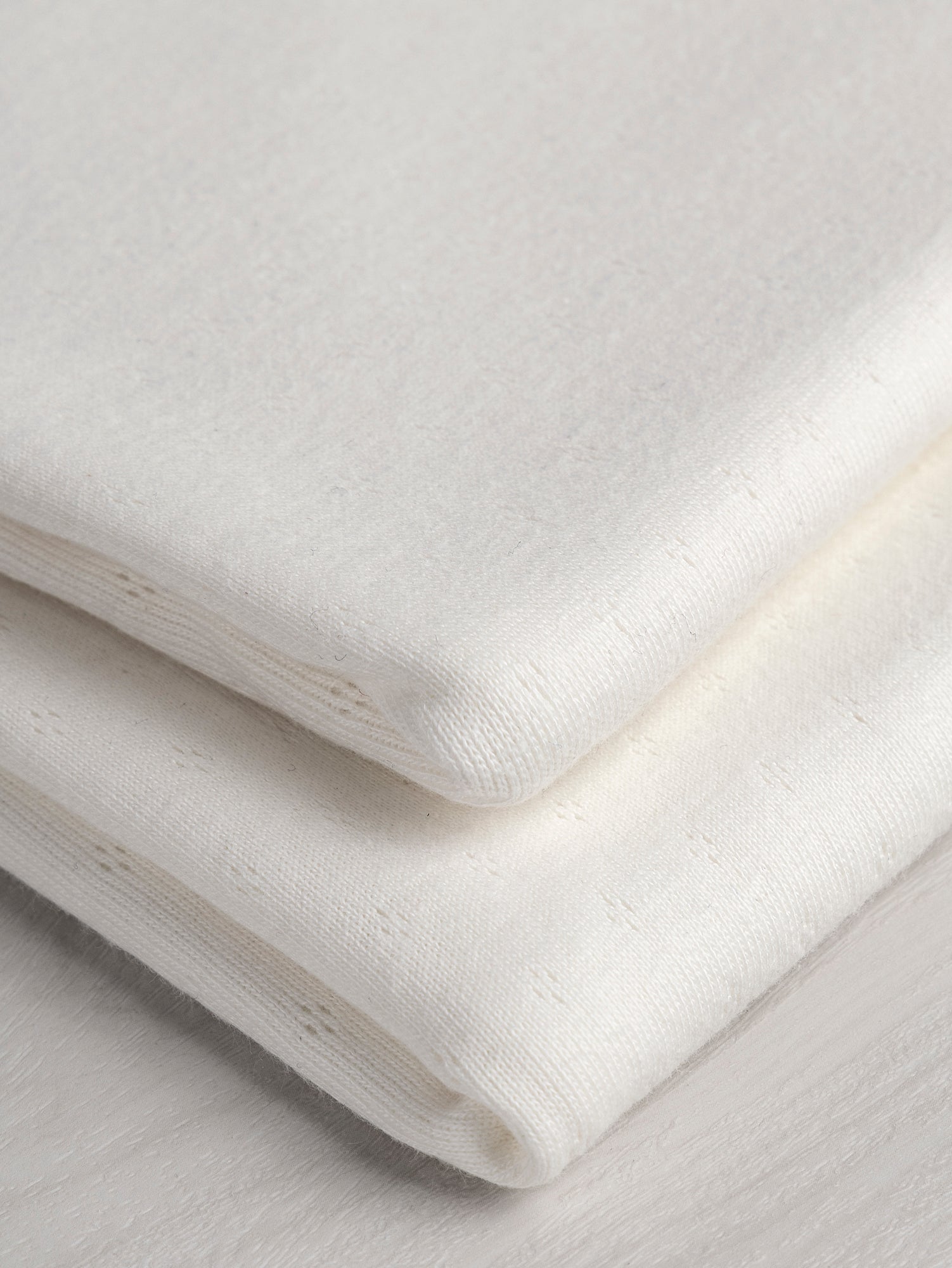 F-COT329-001-Pointelle-Jersey-Knit-Cream-Core-Fabrics-fold.JPG