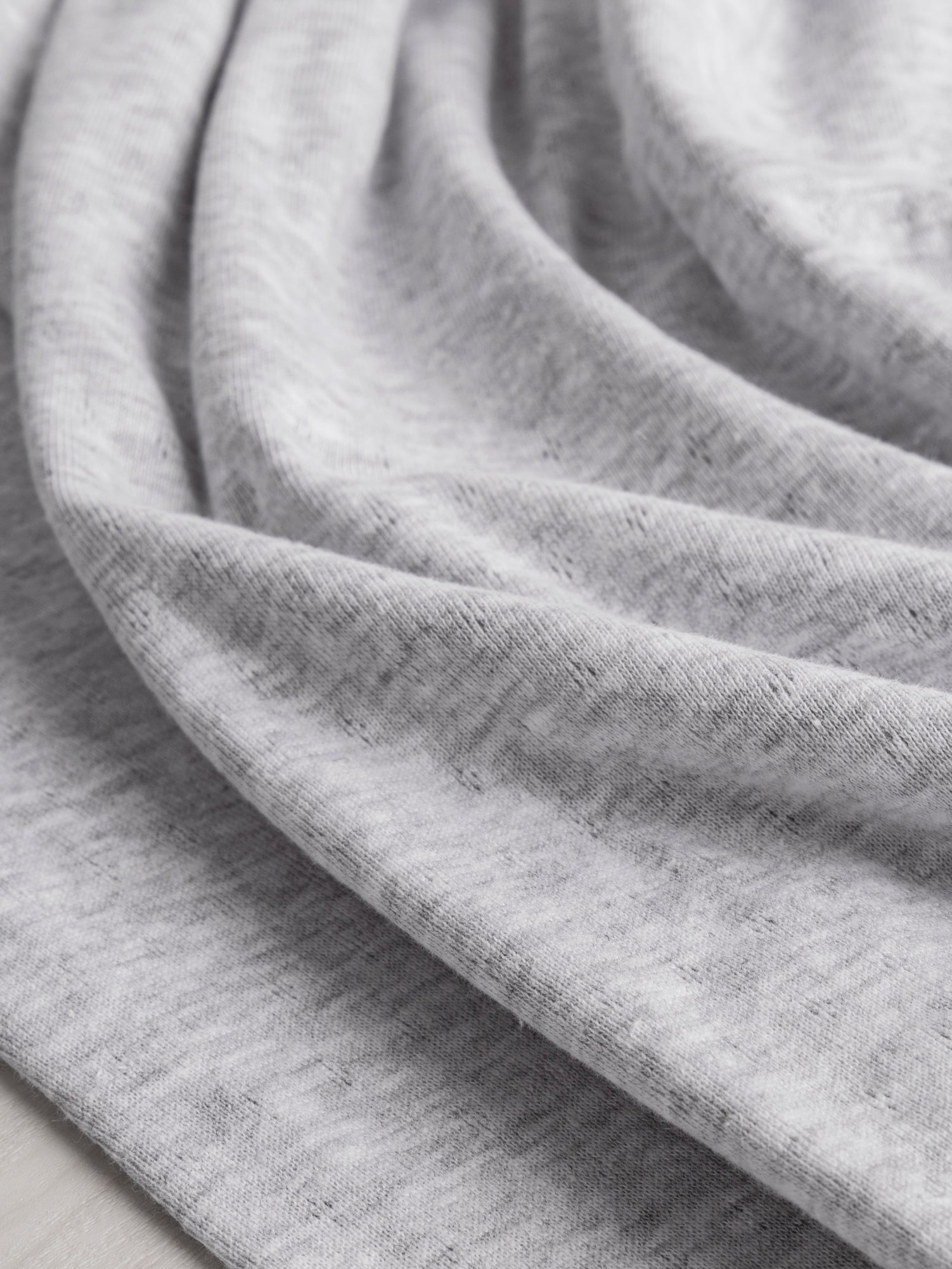 F-COT329-002-Pointelle-Jersey-Knit-Heather-Grey-Core-Fabrics-scrunched.JPG