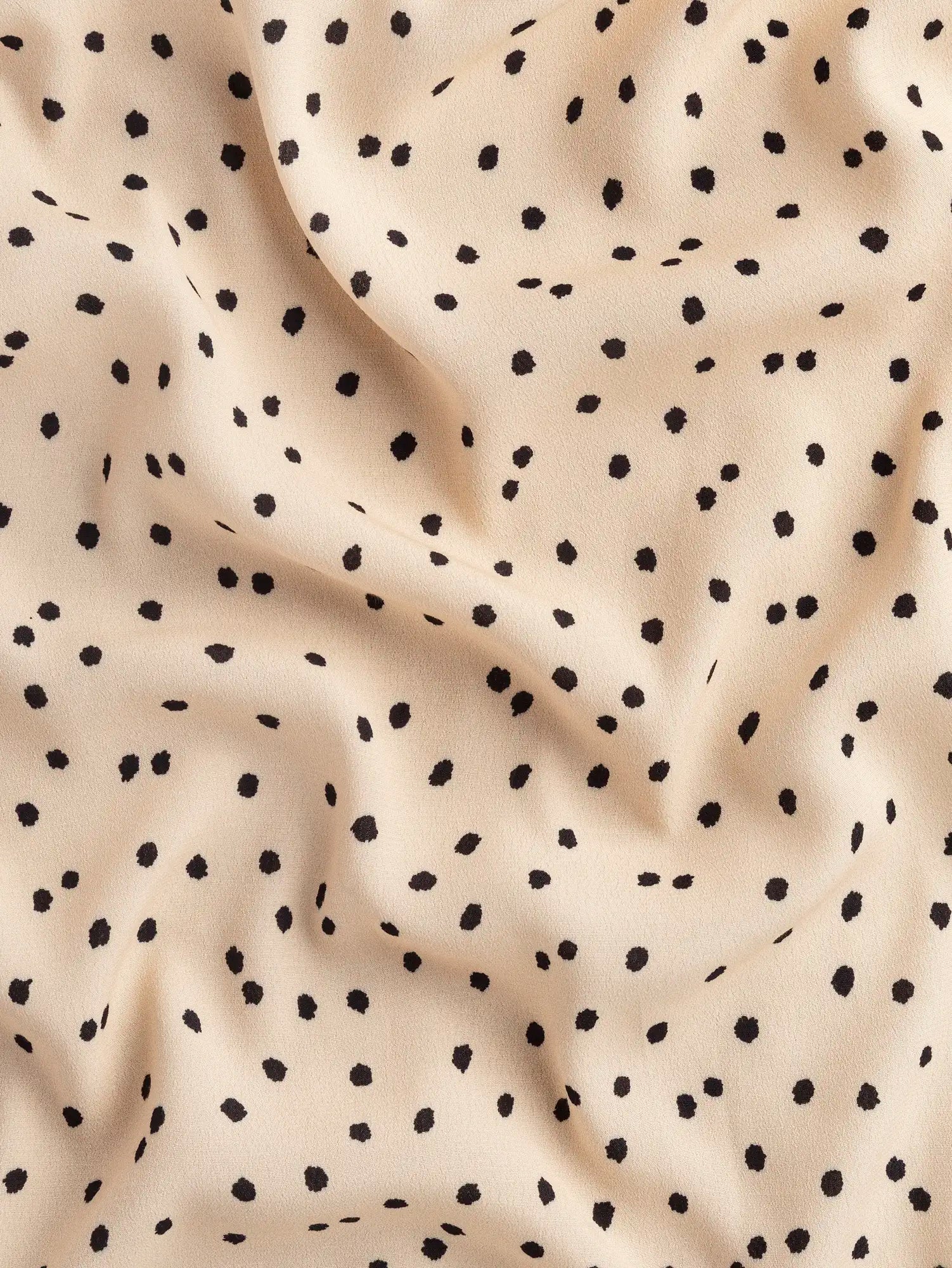 F-VIS295-Polka-Dot-Ecovero-Crepe-de-Chine-Oat-and-Black-Core-Fabrics-scrunched.webp