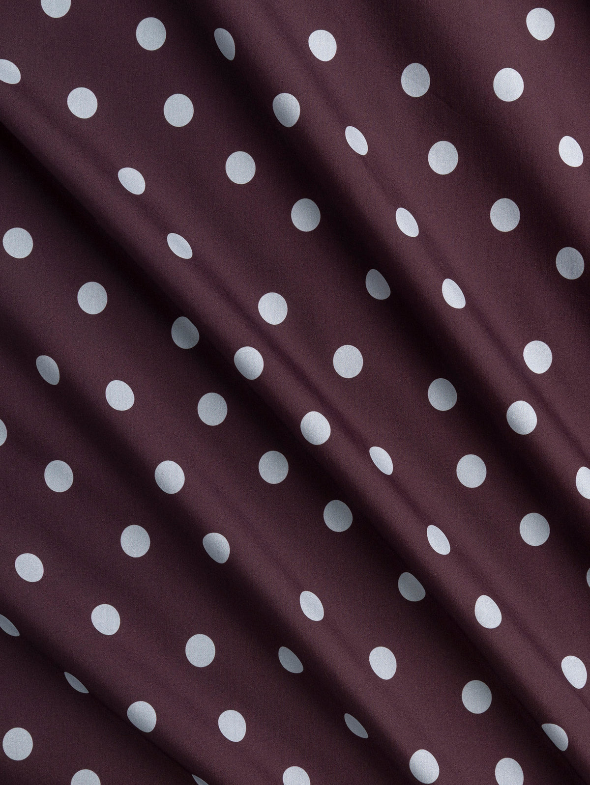 F-COT506-001-Polka-Dot-Print-Cotton-Poplin-Aubergine-and-Chambray-Core-Fabrics-scrunched.webp