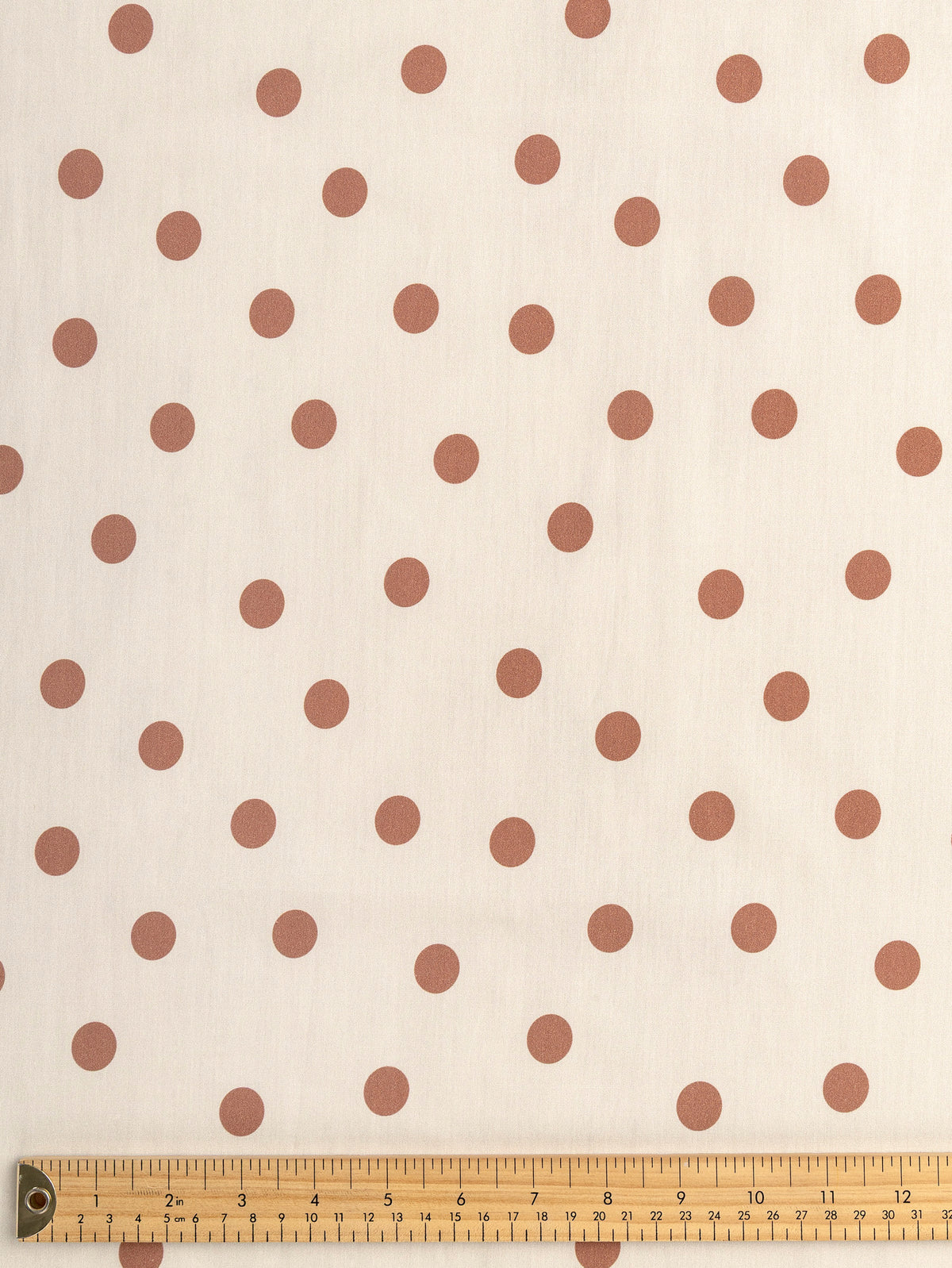 F-COT506-002-Polka-Dot-Print-Cotton-Poplin-Ivory-and-Caramel-Core-Fabrics-ruler.webp