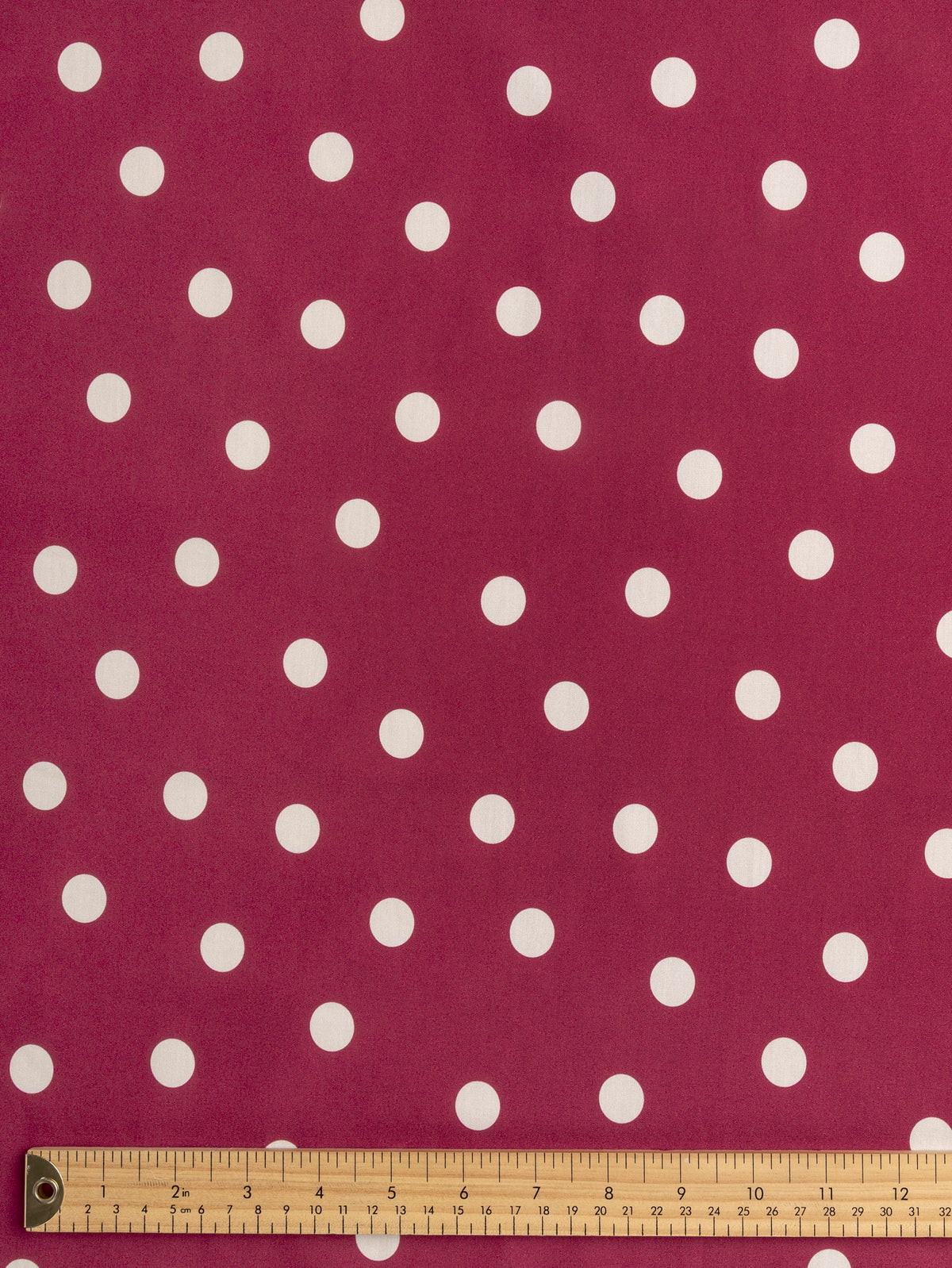 F-COT506-003-Polka-Dot-Print-Cotton-Poplin-Raspberry-and-Ivory-Core-Fabrics-ruler.webp