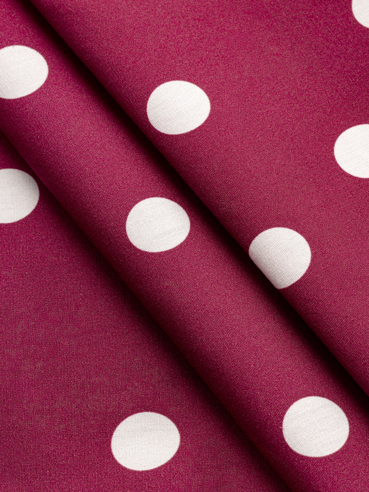 F-COT506-003-Polka-Dot-Print-Cotton-Poplin-Raspberry-and-Ivory-Core-Fabrics-fold.webp