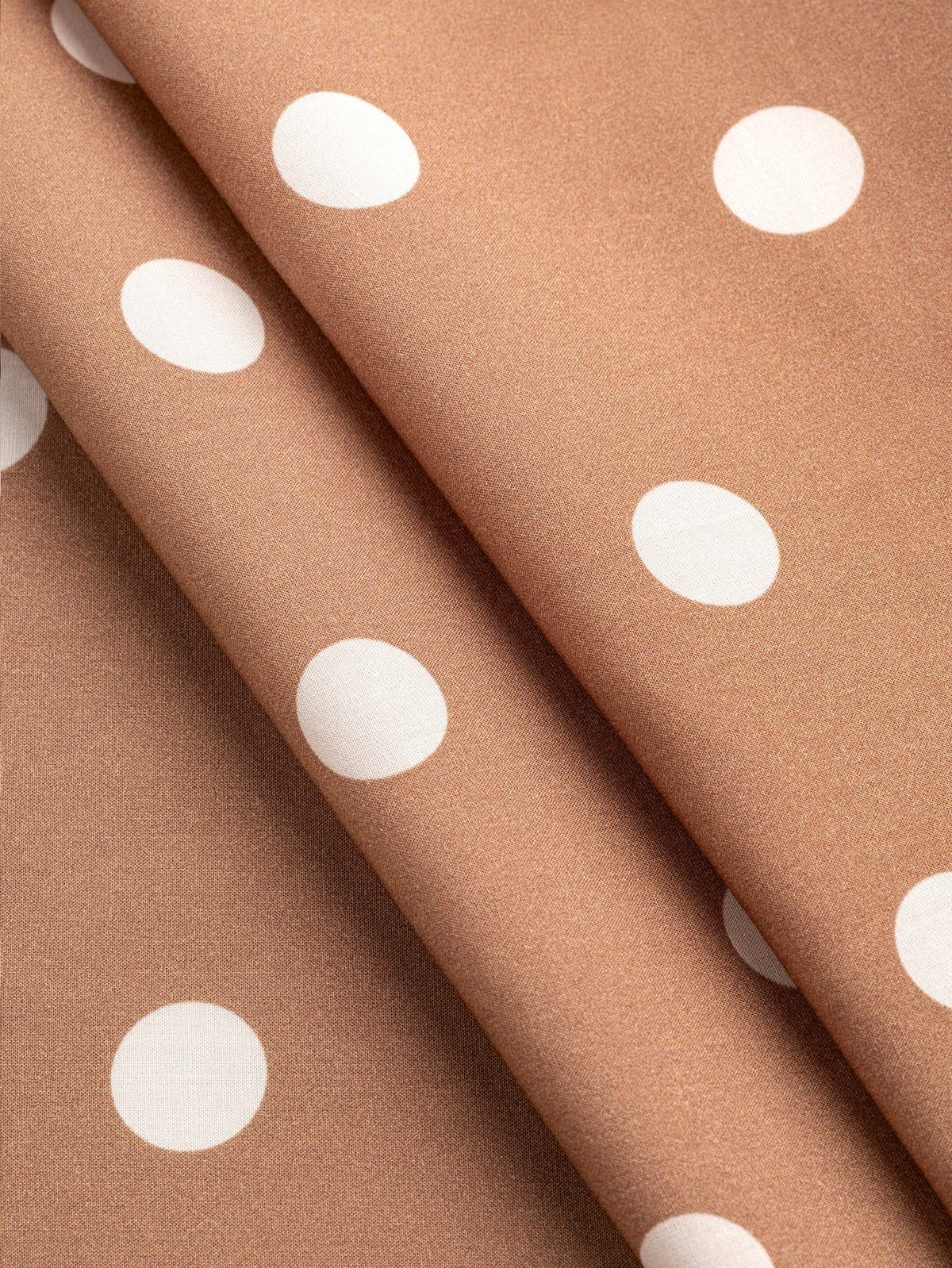 F-TEN023-002-Polka-Dot-Print-Lyocell-Biscuit-and-Ivory-Core-Fabrics-fold.webp