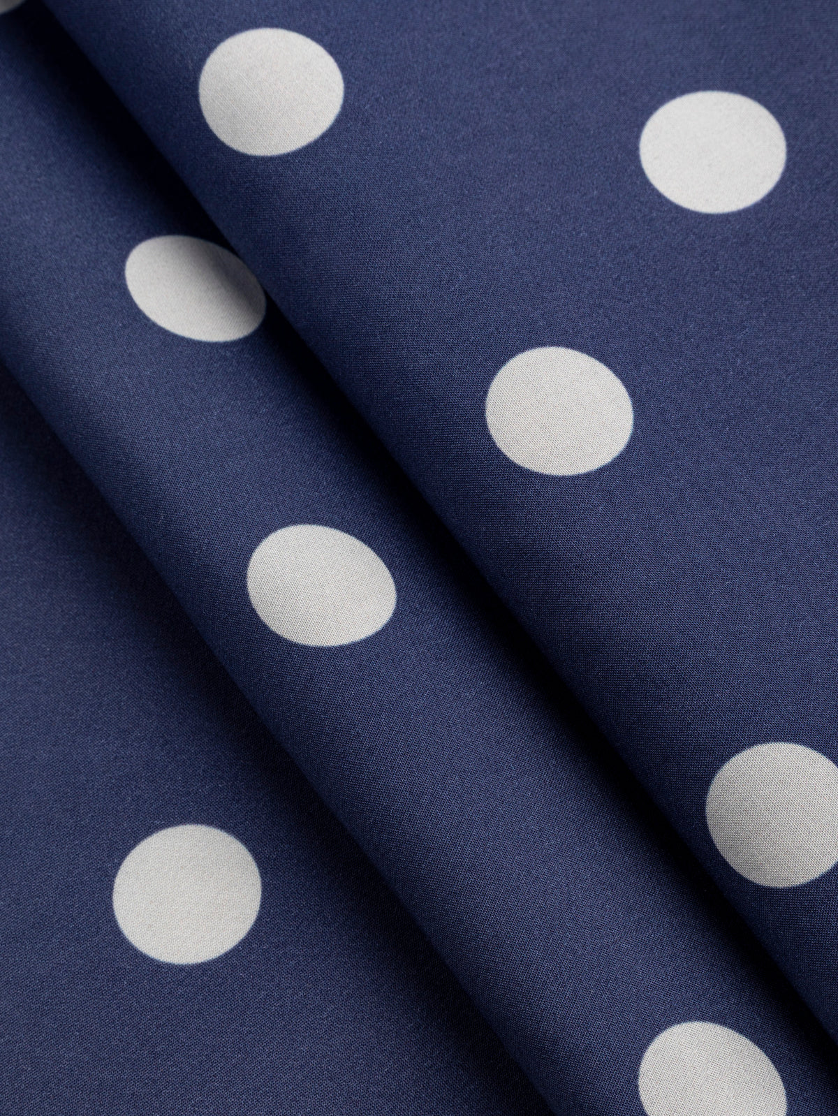 F-TEN023-003-Polka-Dot-Print-Lyocell-Indigo-and-Ice-Core-Fabrics-fold.webp