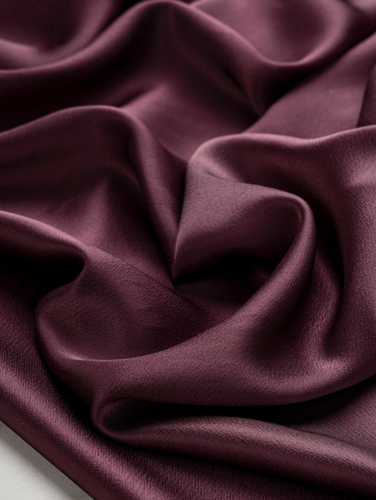 F-DEA113-Poly-Blend-Satin-Deadstock-Aubergine-Core-Fabrics-scrunched.JPG