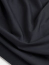 F-PES035-001-Poly-Brushed-Stretch-Jersey-Knit-Deadstock-Black-Core-Fabrics-scrunched.JPG