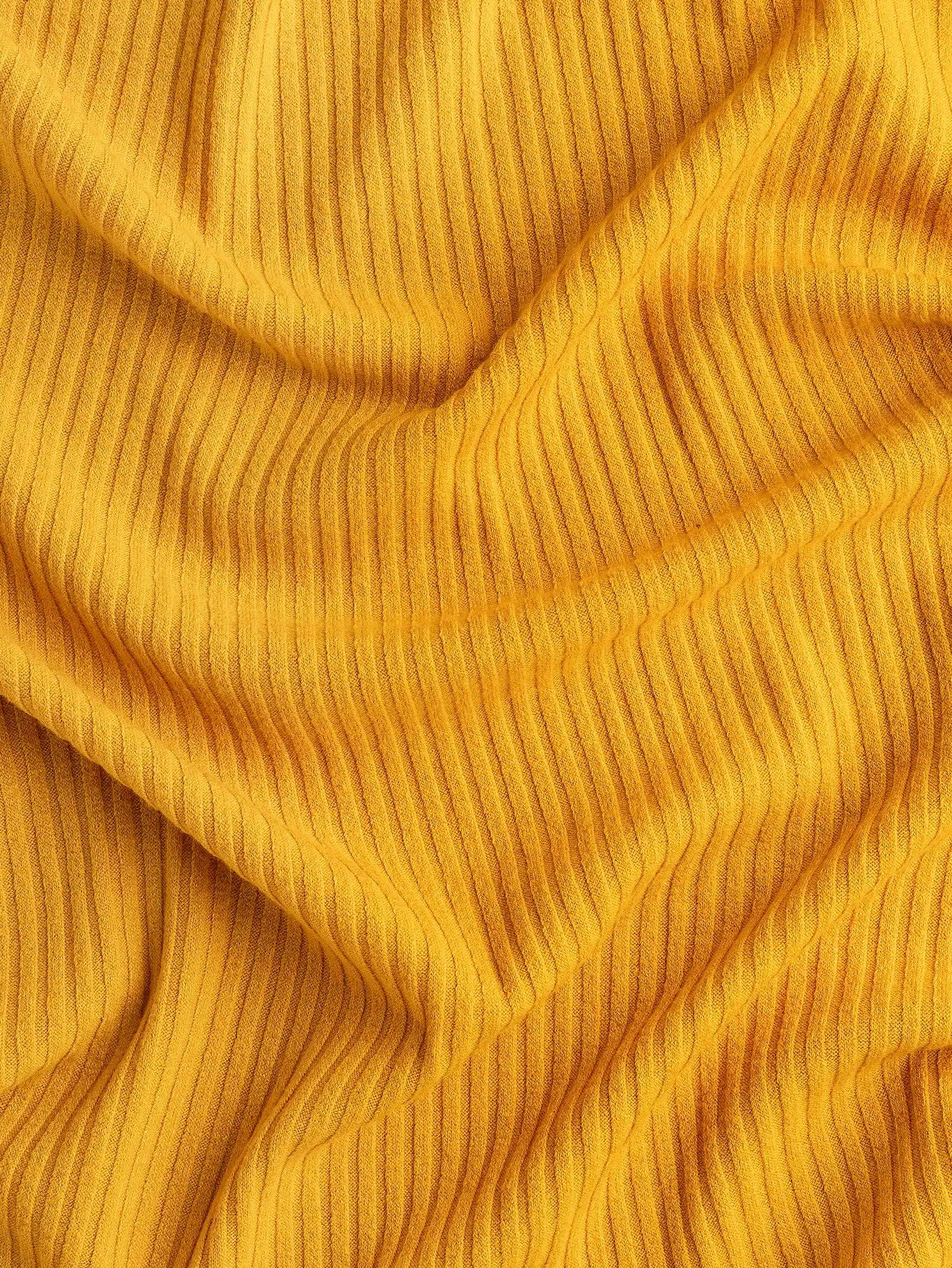 F-DEA209-Polyester-Cotton-Stretch-Rib-Knit-Deadstock-Marigold-Core-Fabrics-scrunched.webp