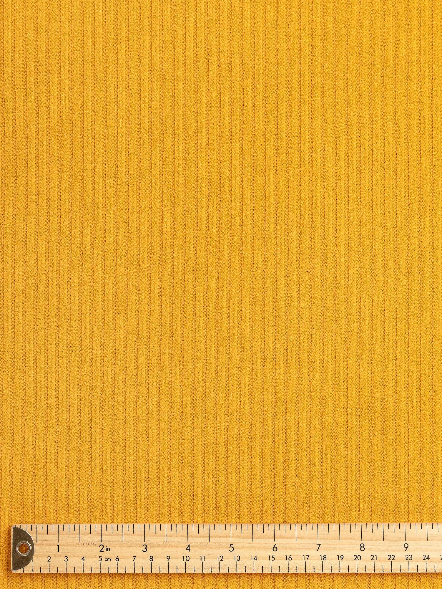 F-DEA209-Polyester-Cotton-Stretch-Rib-Knit-Deadstock-Marigold-Core-Fabrics-ruler.webp